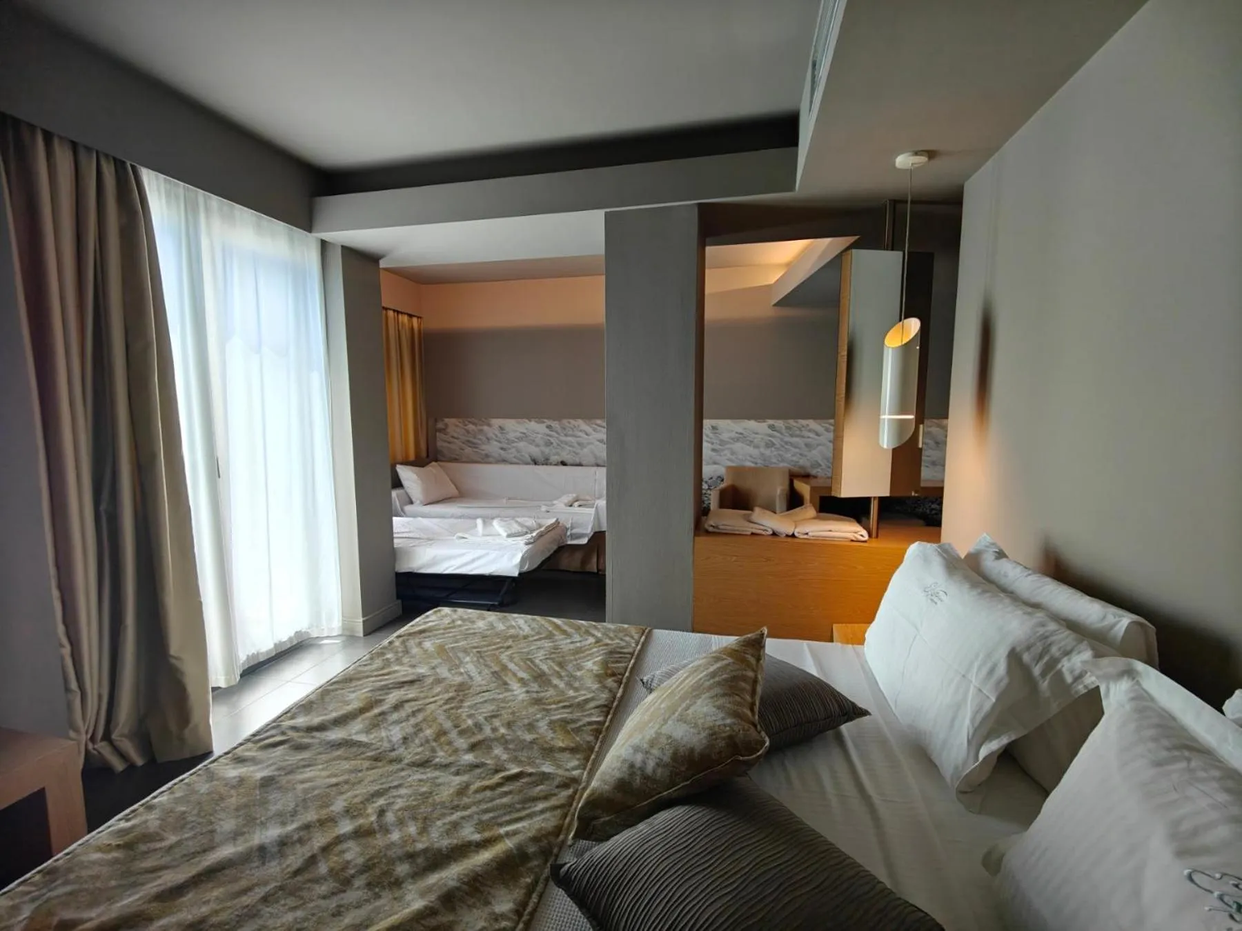 Bed in Elysion Hotel