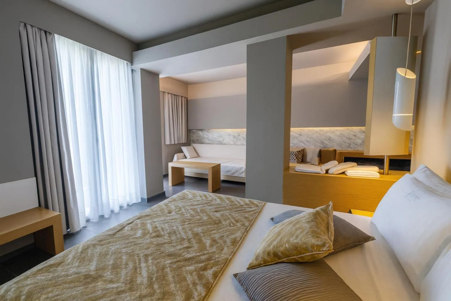 Bed in Elysion Hotel