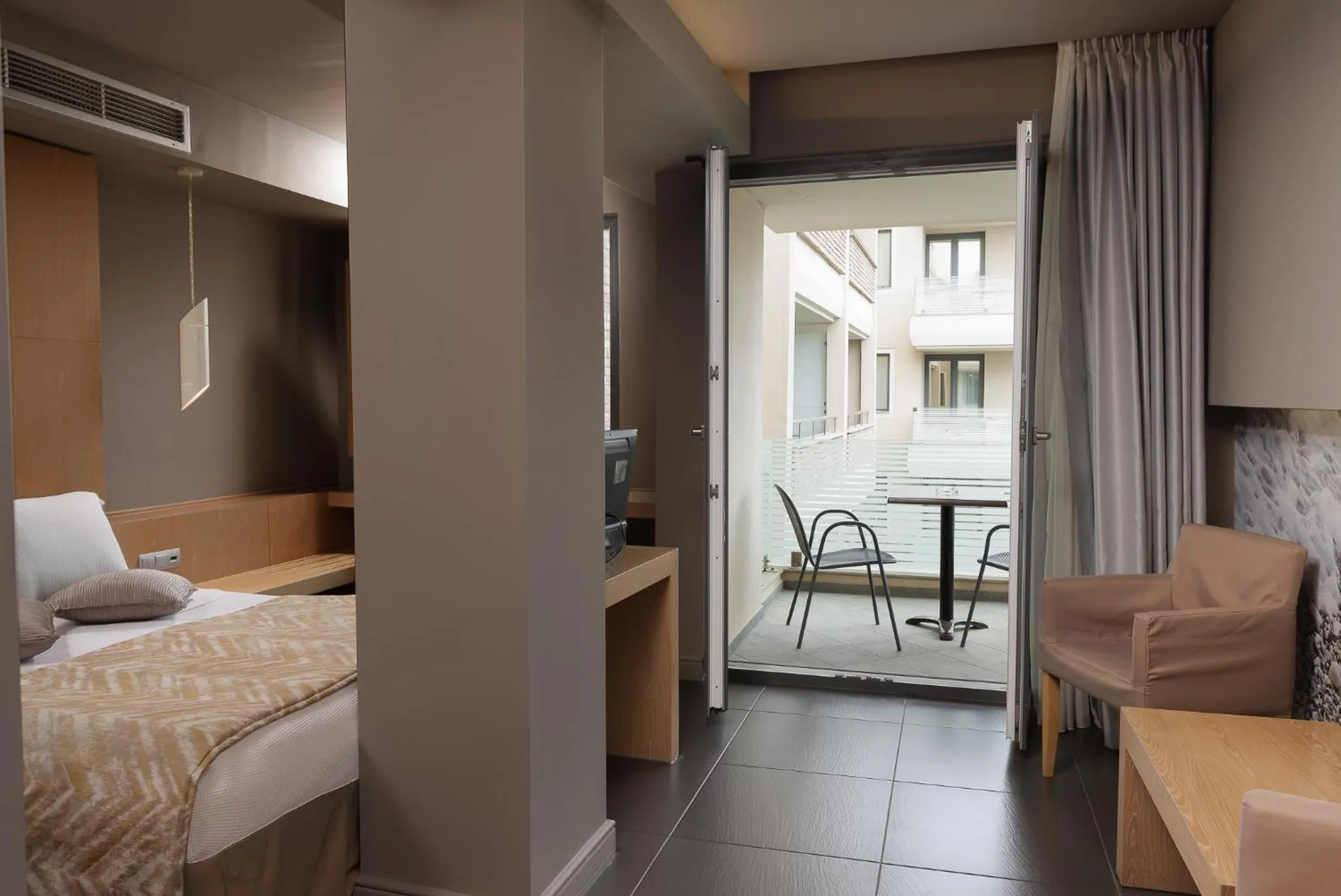 Bed in Elysion Hotel