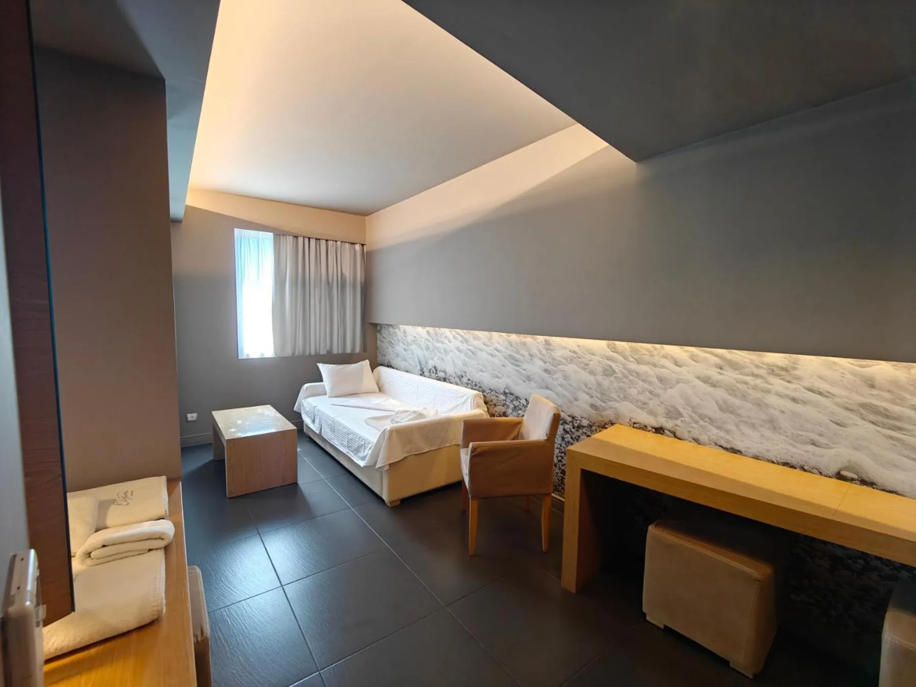 Bed in Elysion Hotel