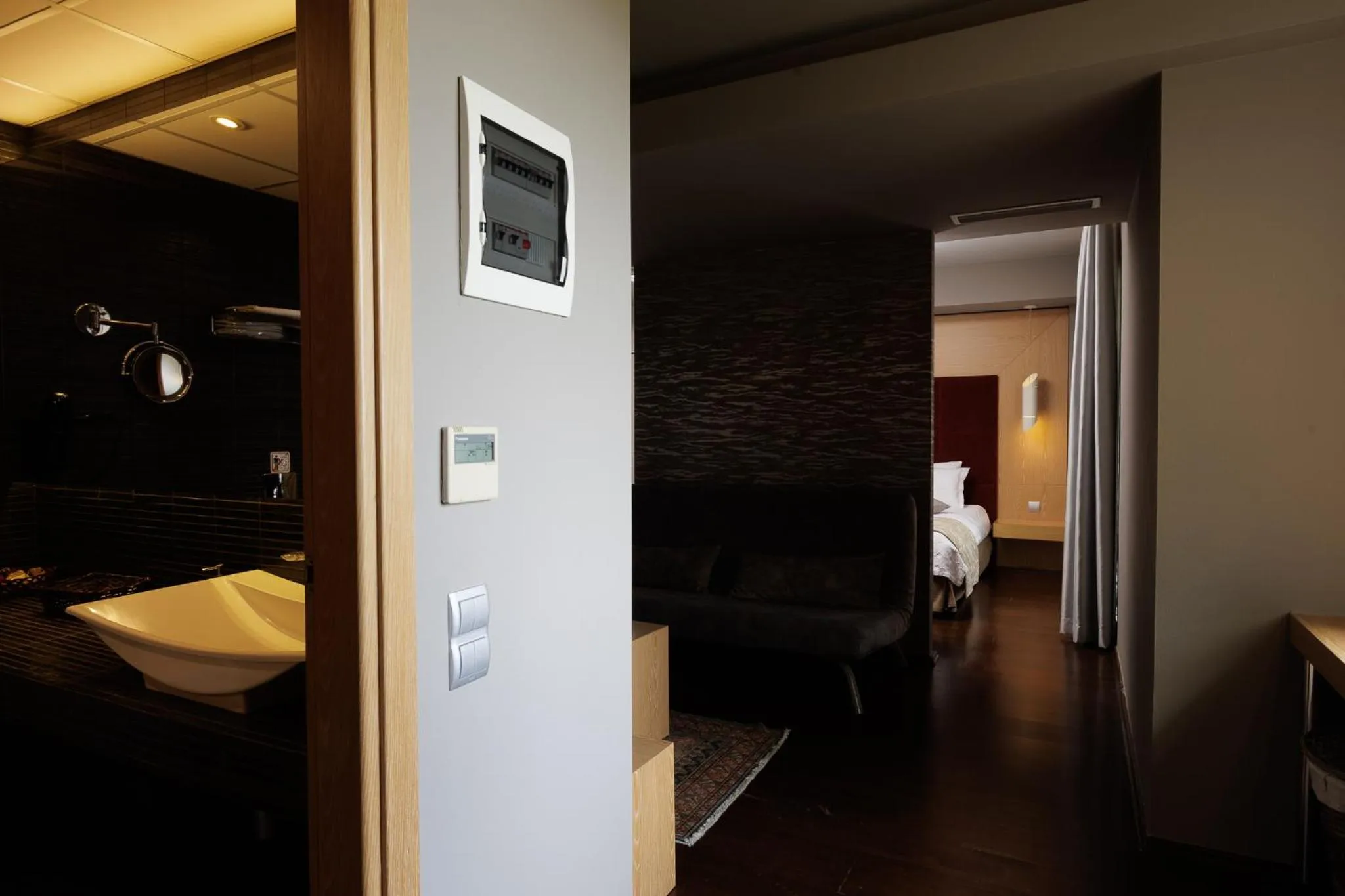 Bed in Elysion Hotel