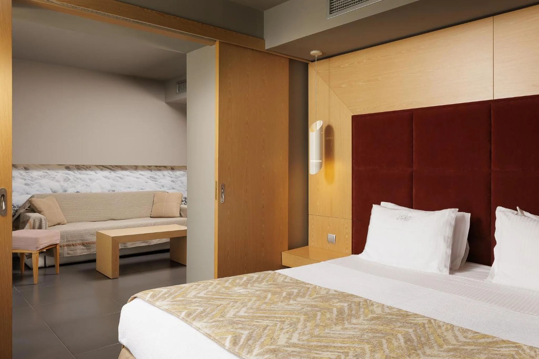 Bed in Elysion Hotel