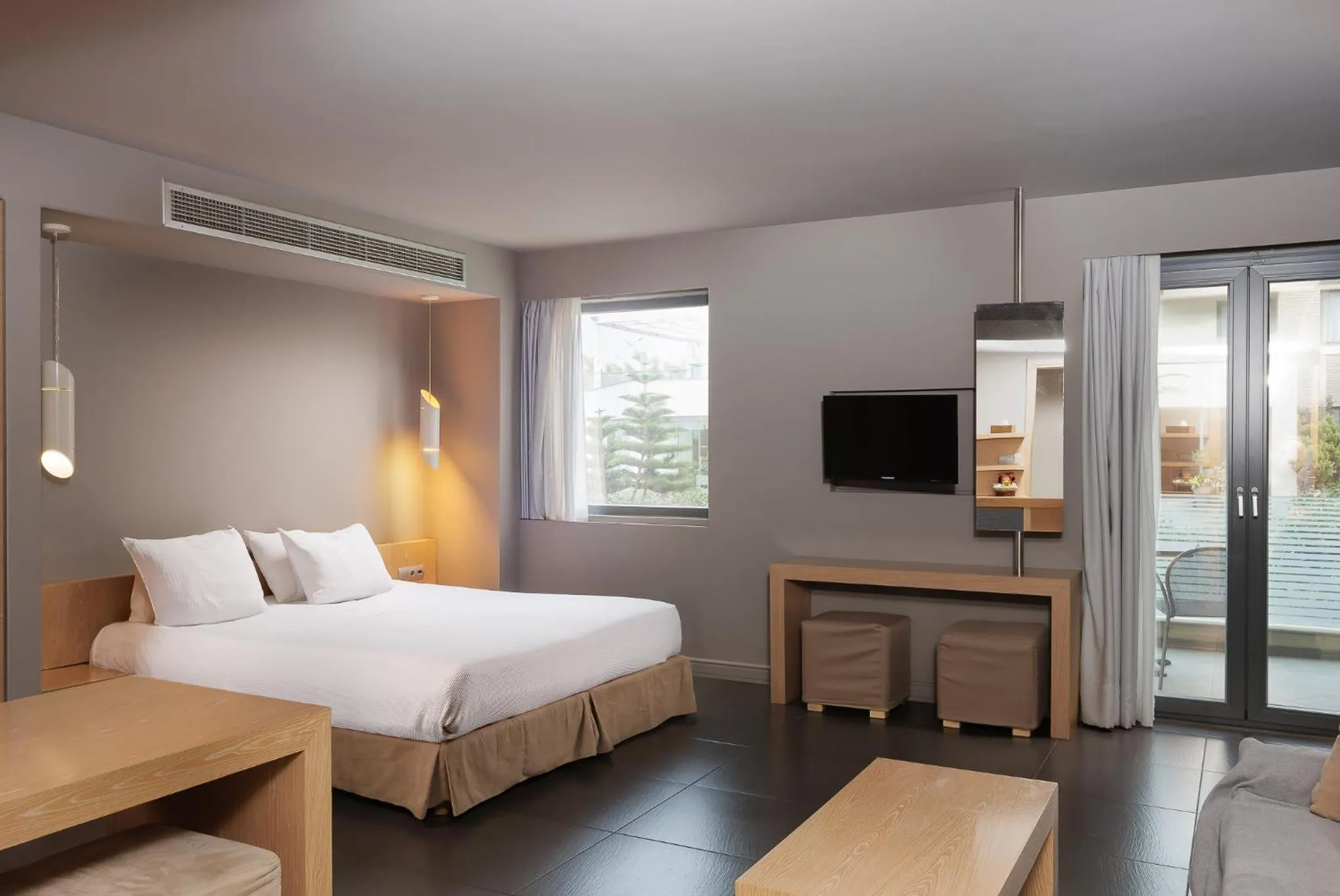 Bed in Elysion Hotel