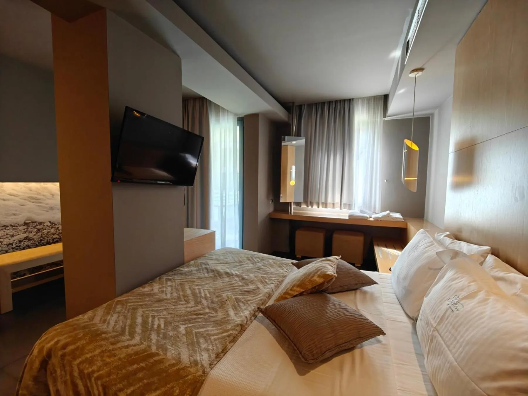 Bed in Elysion Hotel