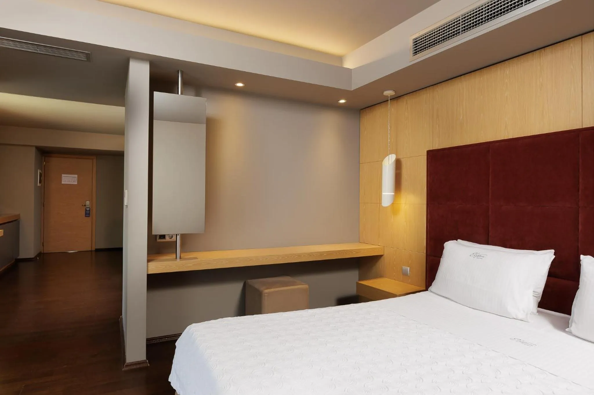 Bed in Elysion Hotel