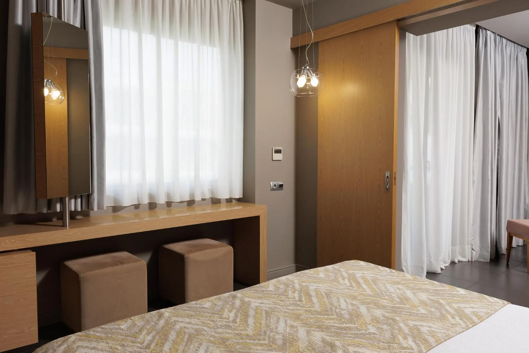 Bed in Elysion Hotel