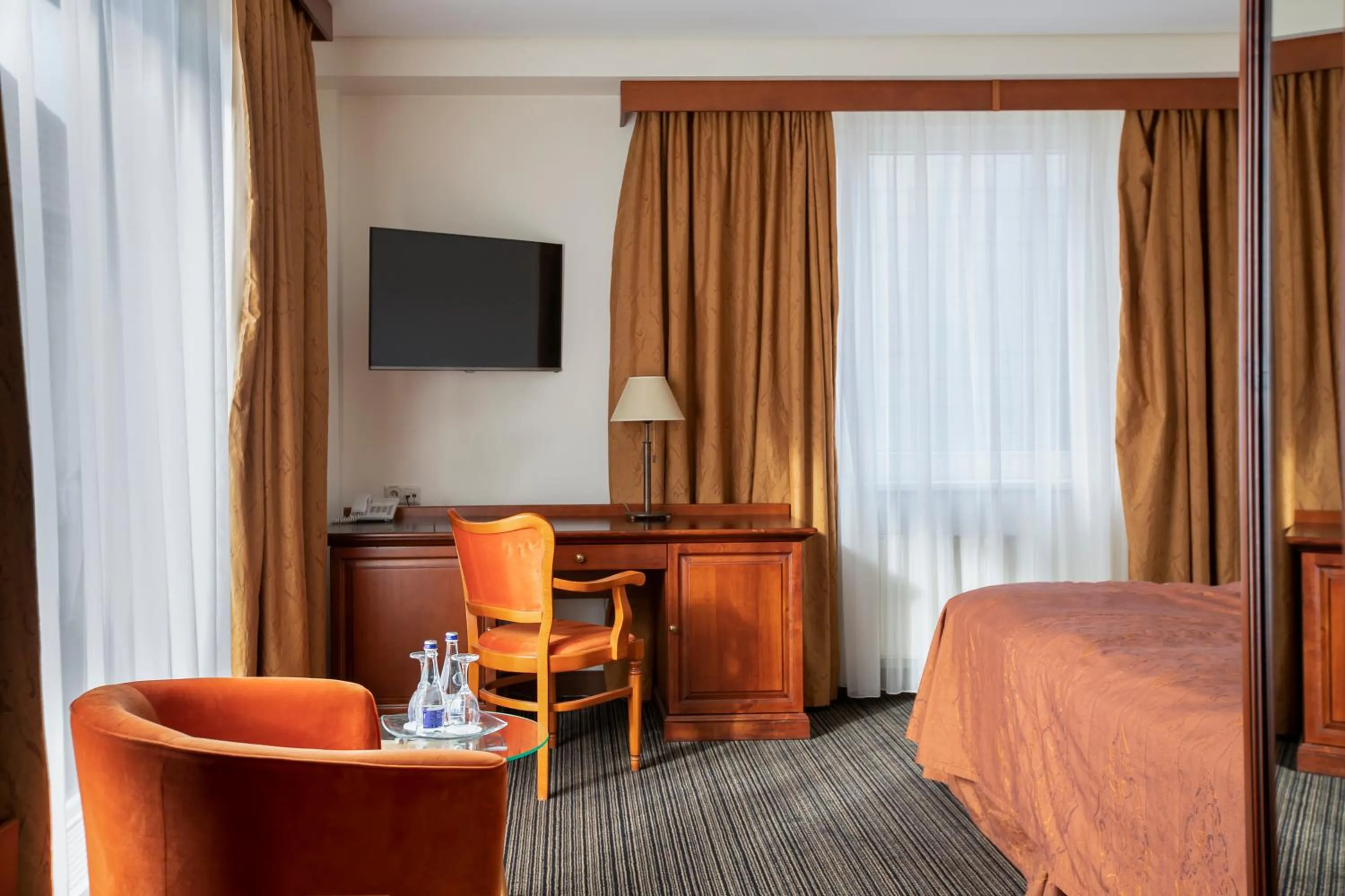 Communal lounge/ TV room, Bed in Daugirdas Old City Hotel