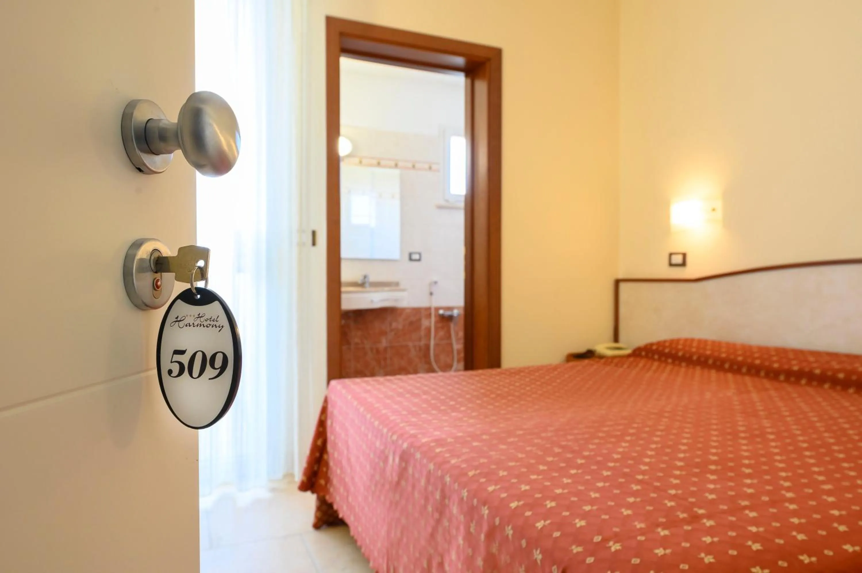 Bedroom, Bed in Hotel Harmony con Piscina panoramica