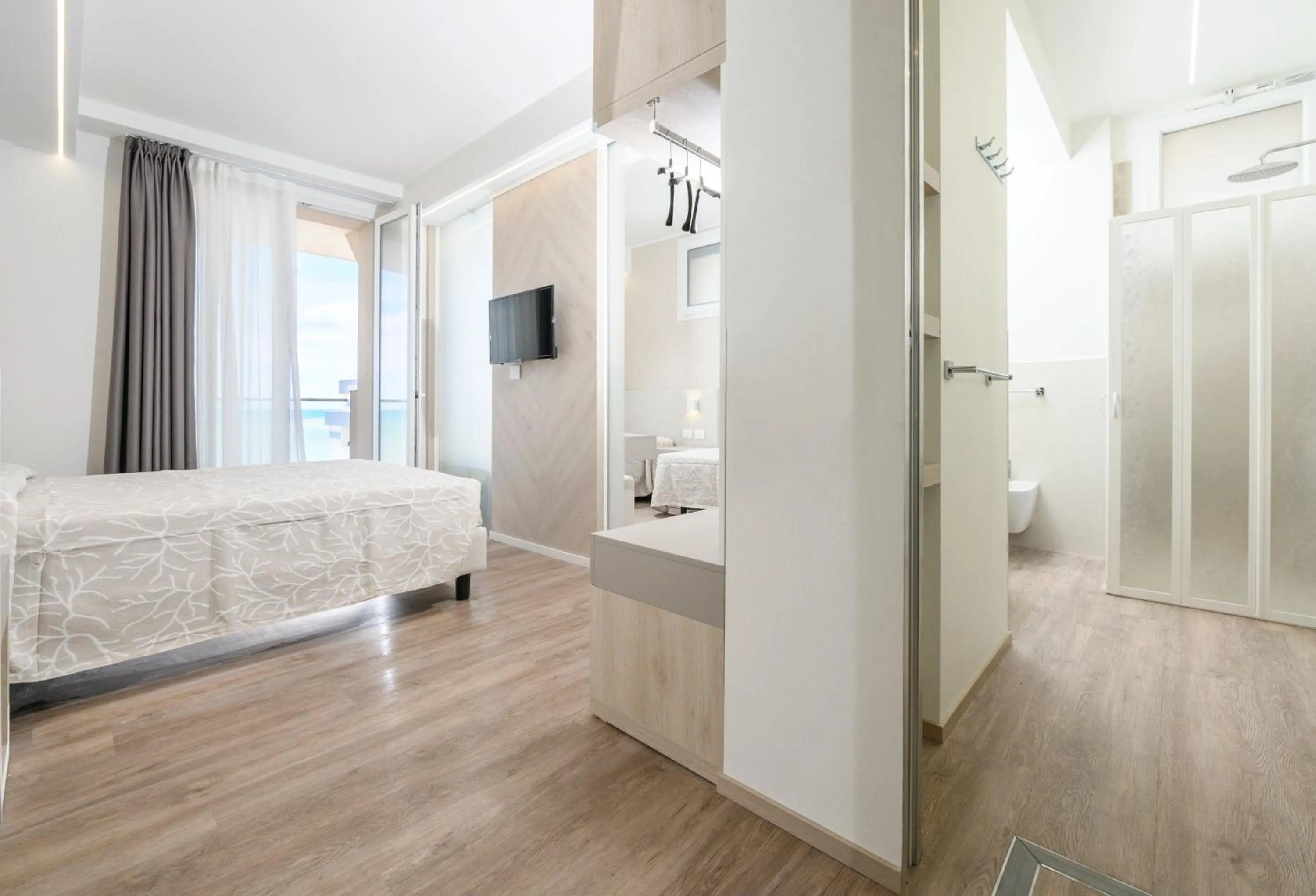 Bedroom, Bed in Hotel Harmony con Piscina panoramica