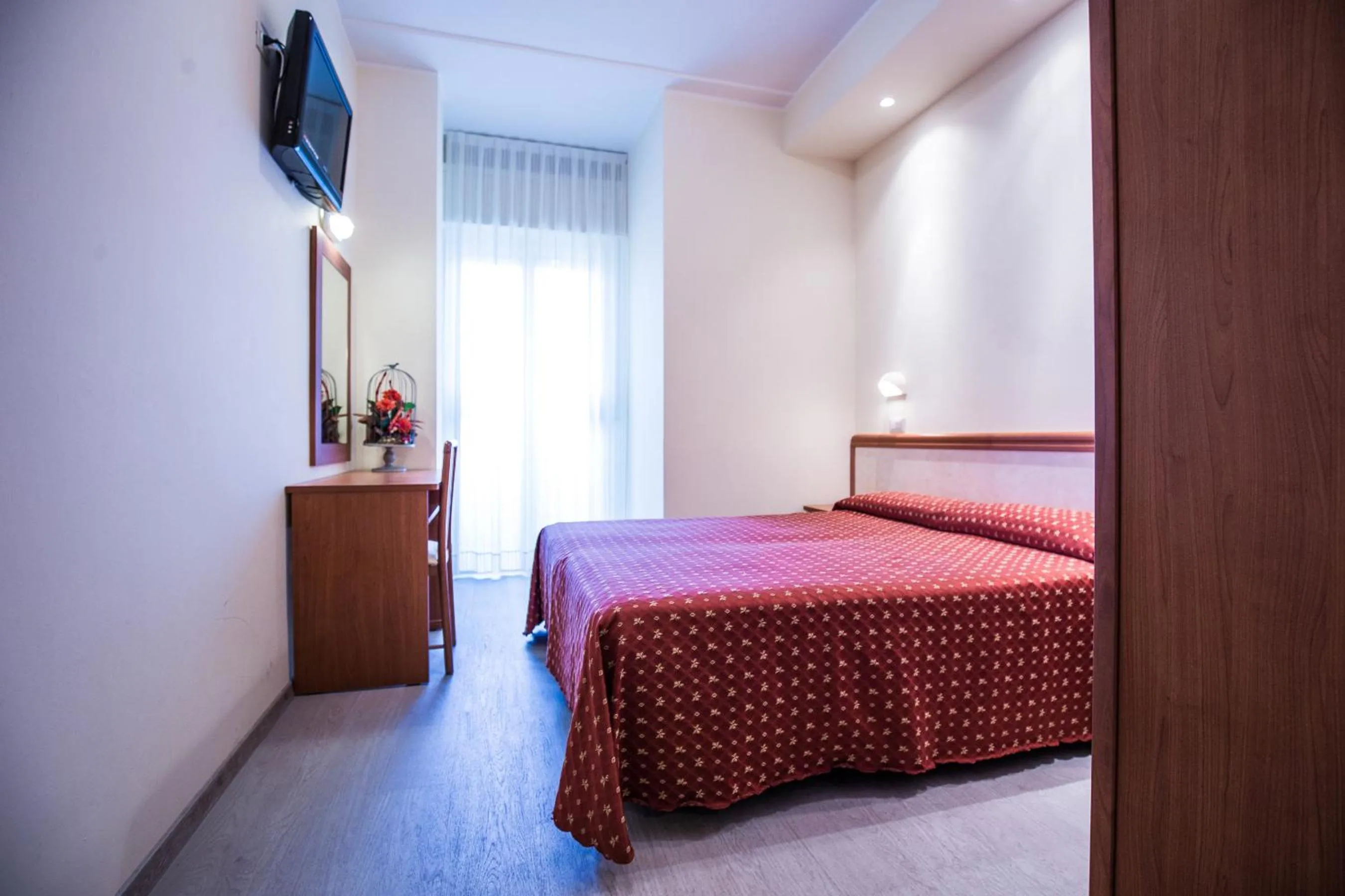 Bedroom, Bed in Hotel Harmony con Piscina panoramica