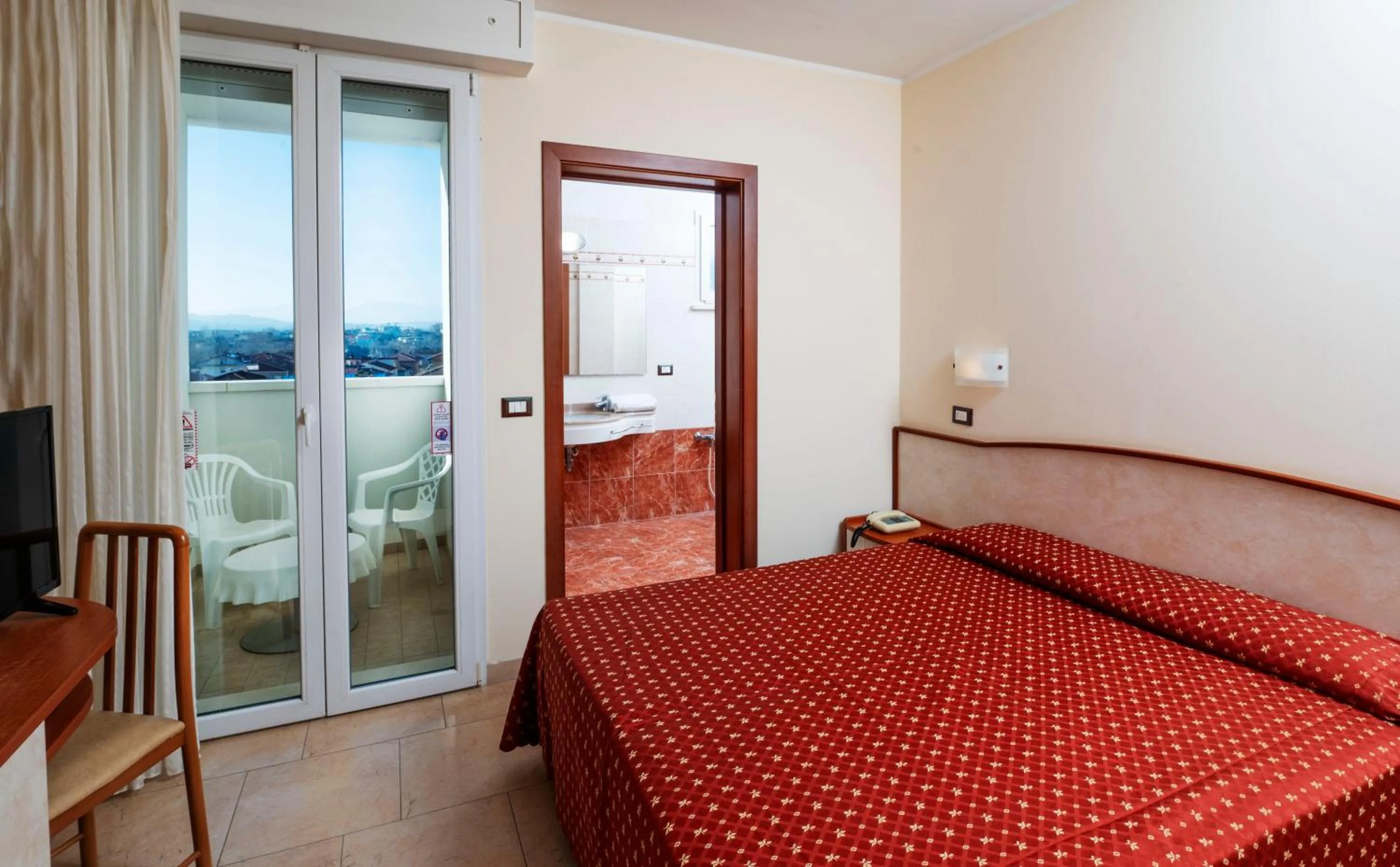 Bedroom, Bed in Hotel Harmony con Piscina panoramica