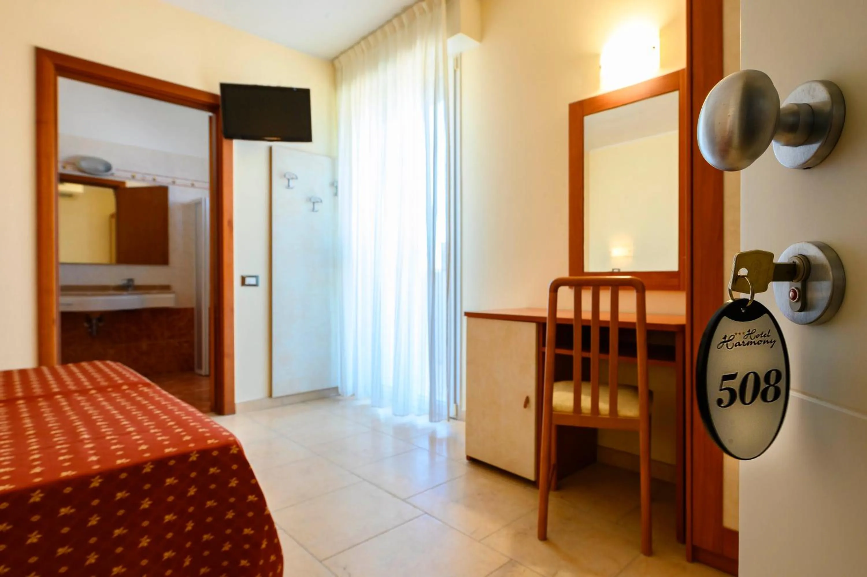 Bedroom, Bed in Hotel Harmony con Piscina panoramica
