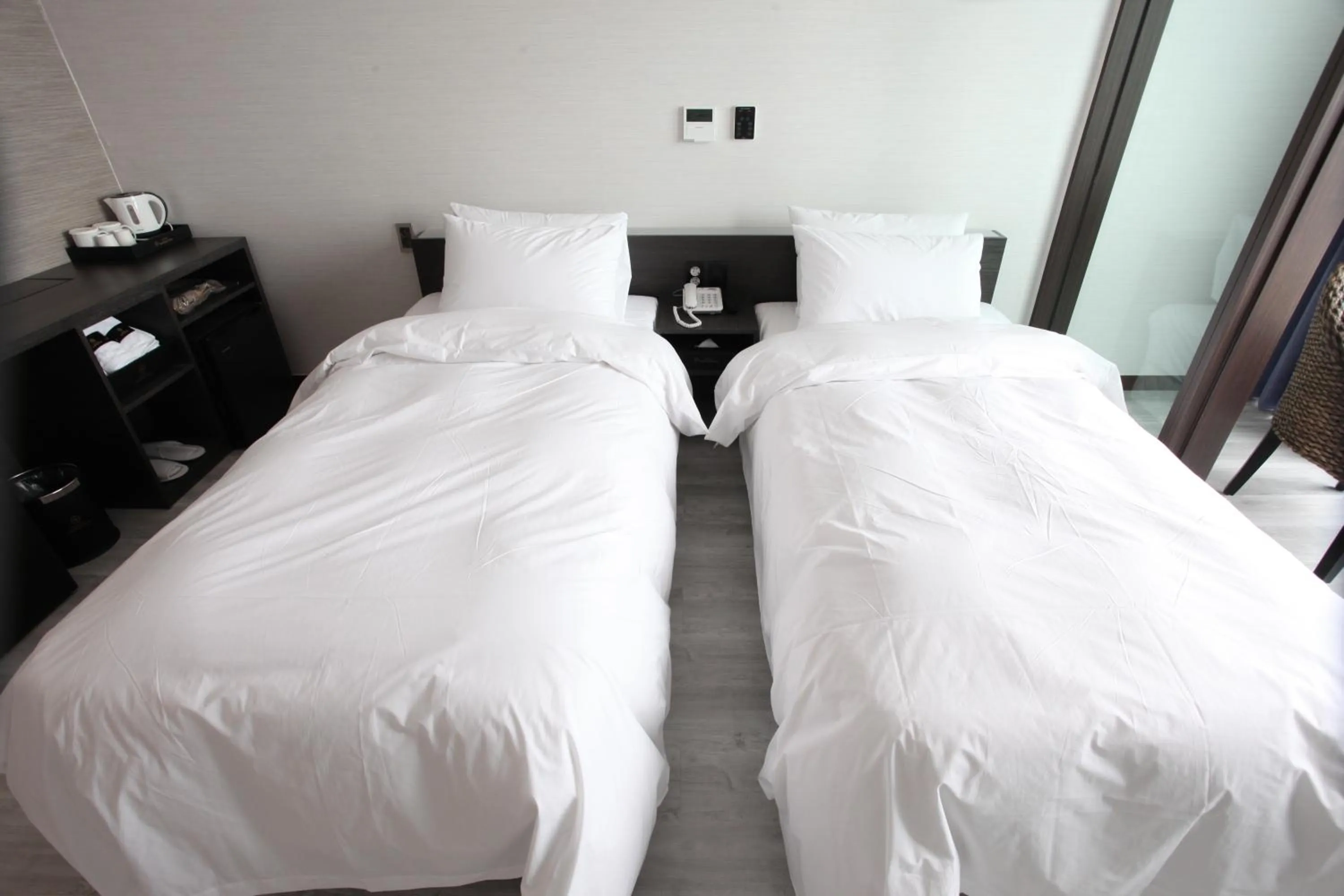 Bed in Hotel Wooyeon Flora