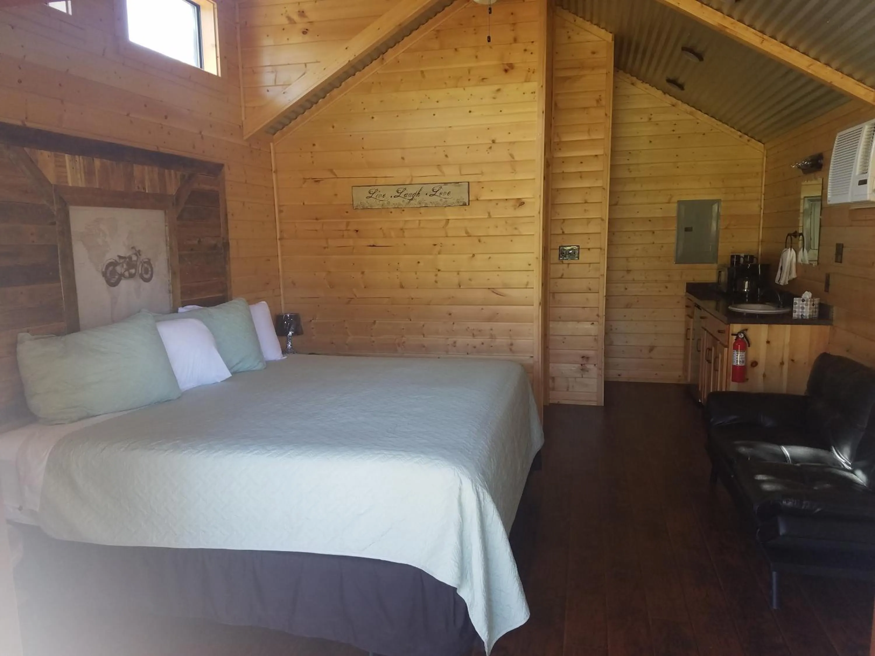 Photo of the whole room, Bed in Al's Hideaway Cabin and RV Space, LLC