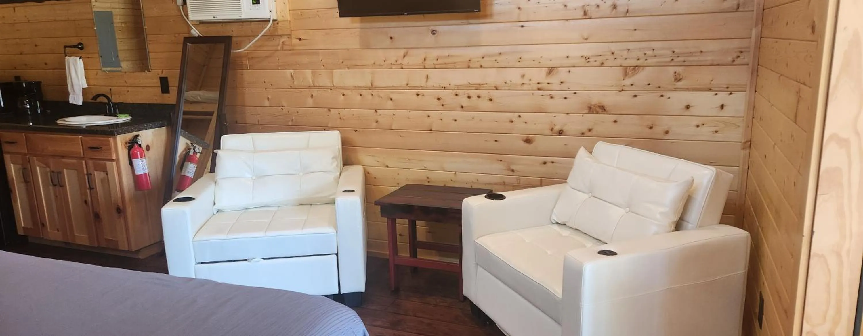 Seating area in Al's Hideaway Cabin and RV Space, LLC