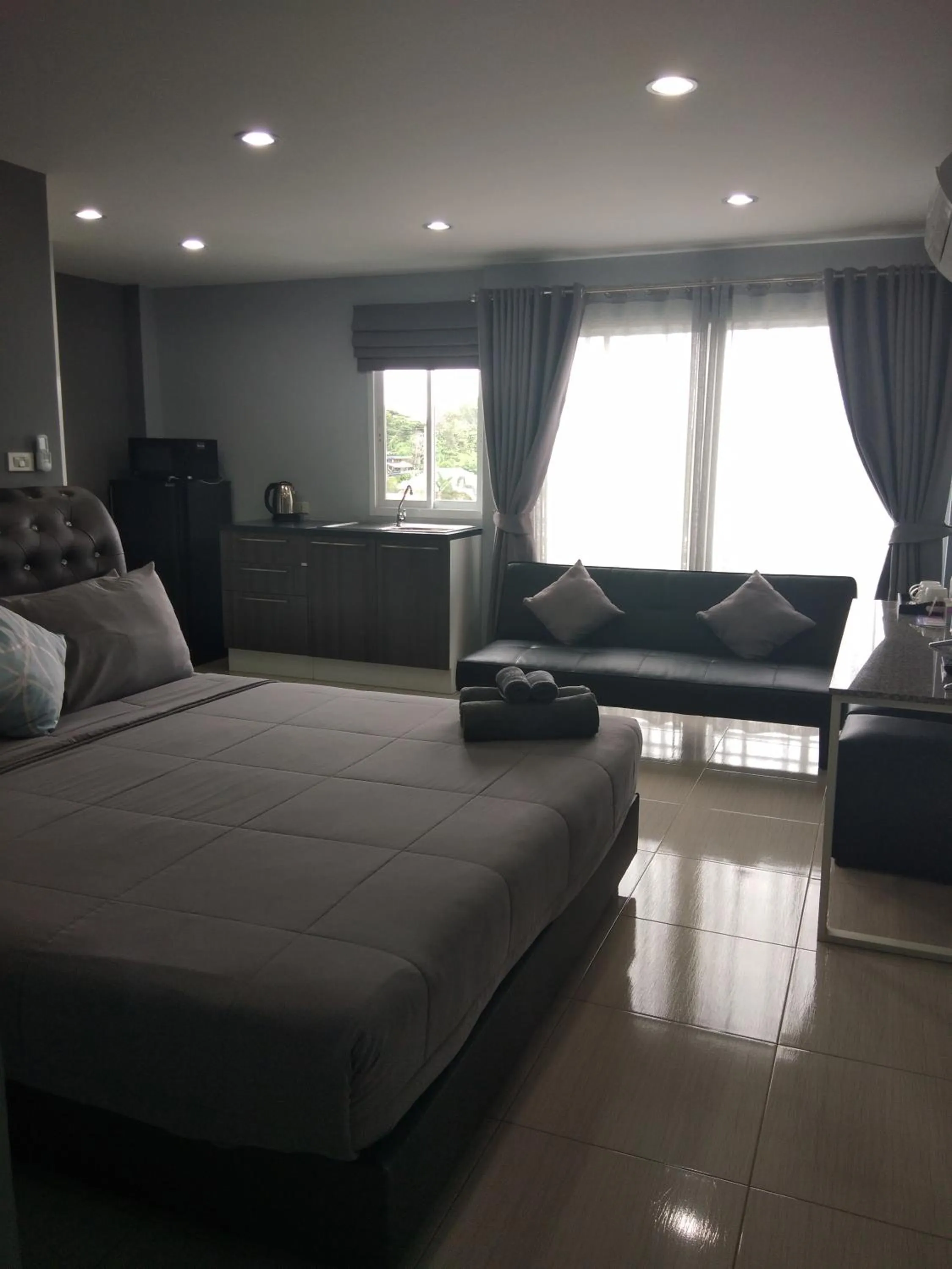 Bed in Asia's Beach Apartments