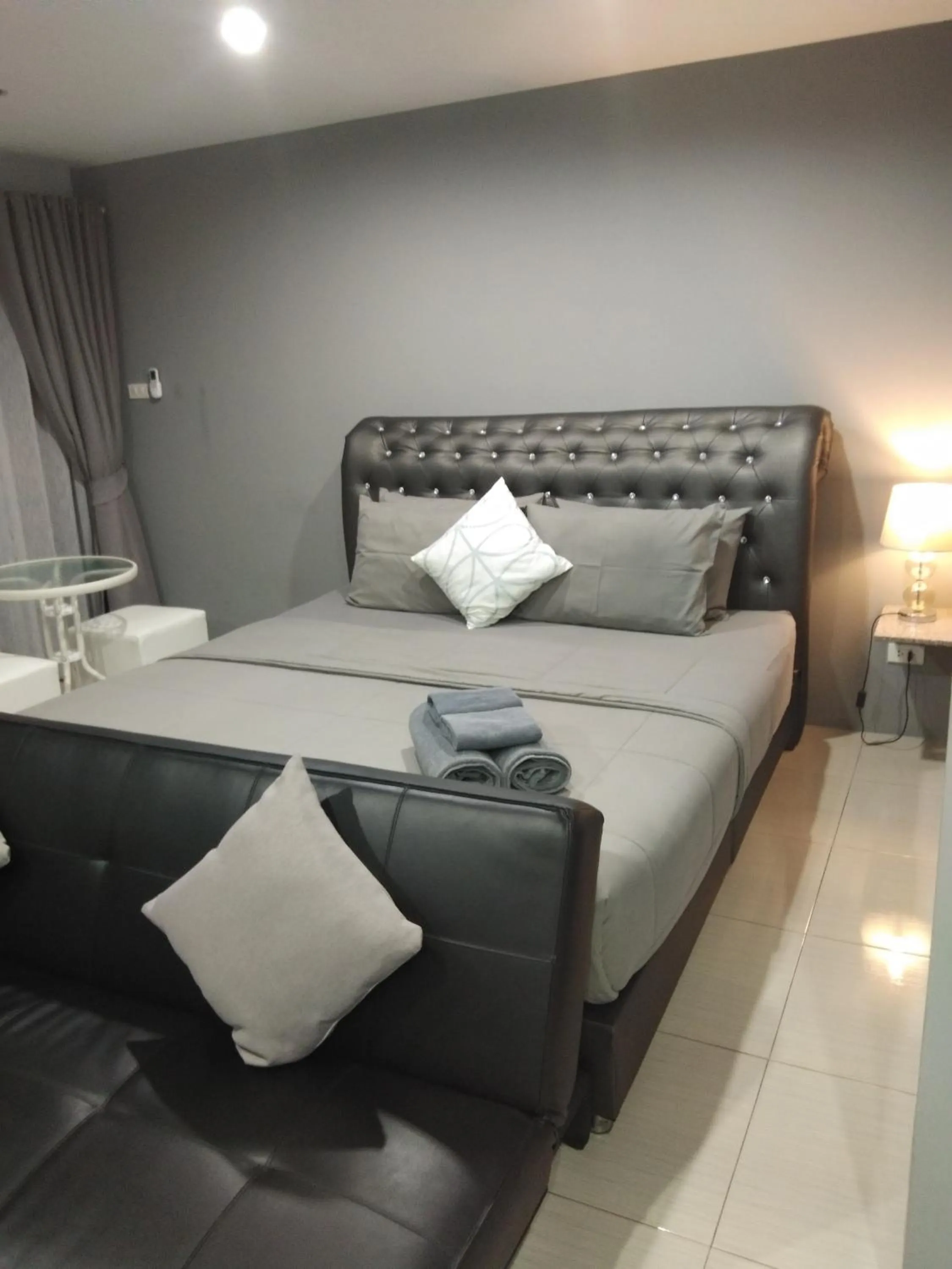 Bed in Asia's Beach Apartments