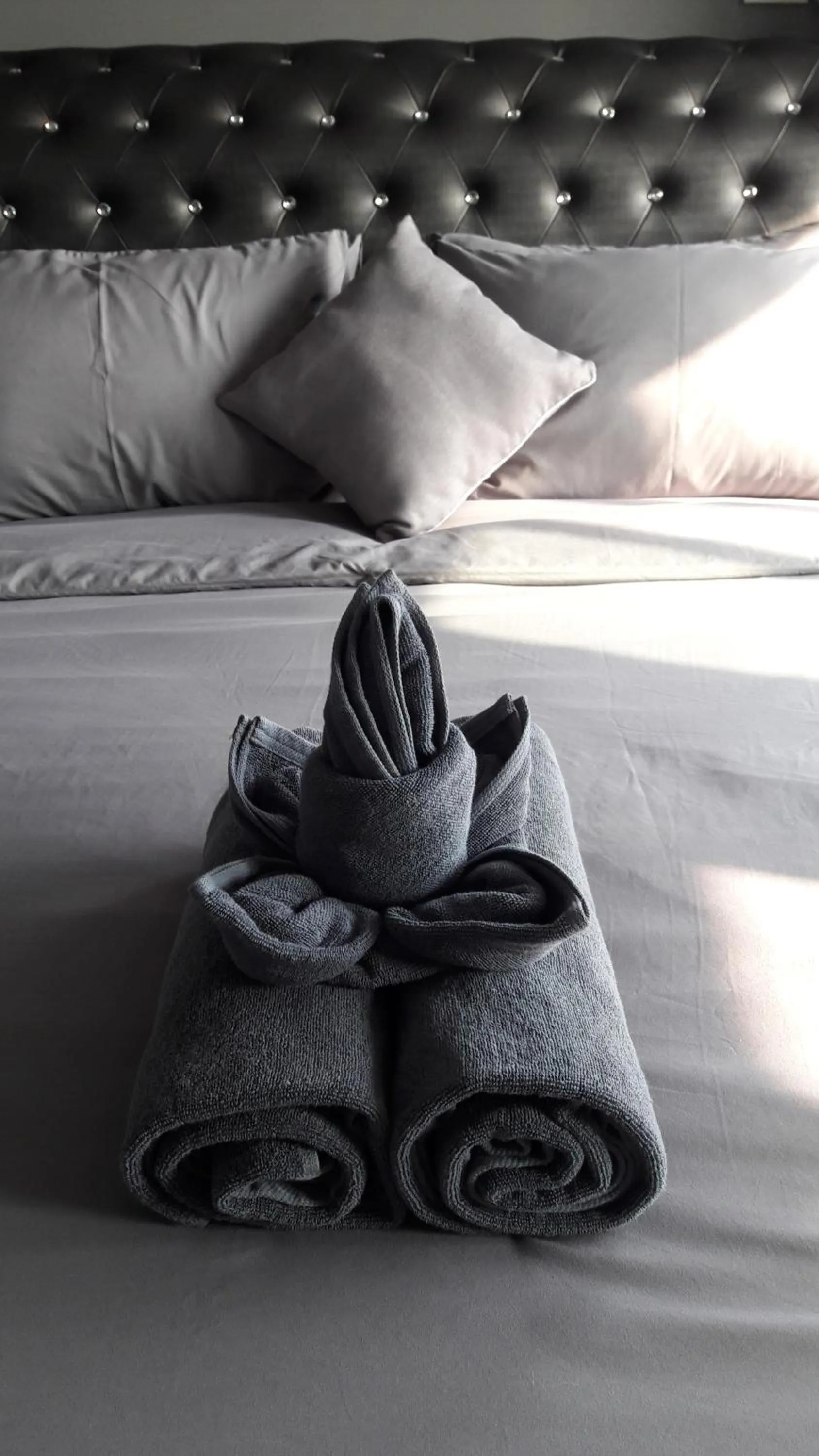 Bed in Asia's Beach Apartments