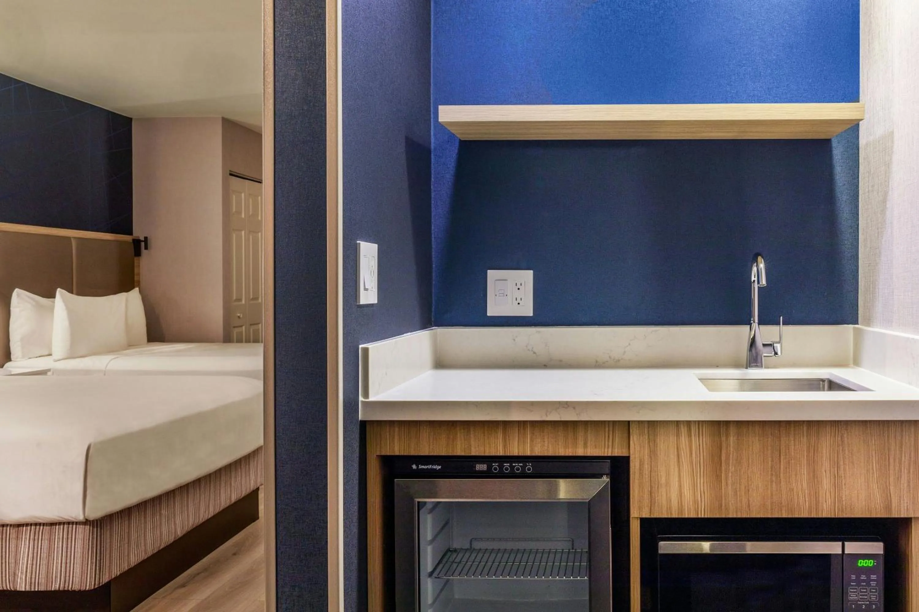 Kitchen or kitchenette, Bed in SpringHill Suites Denver North / Westminster