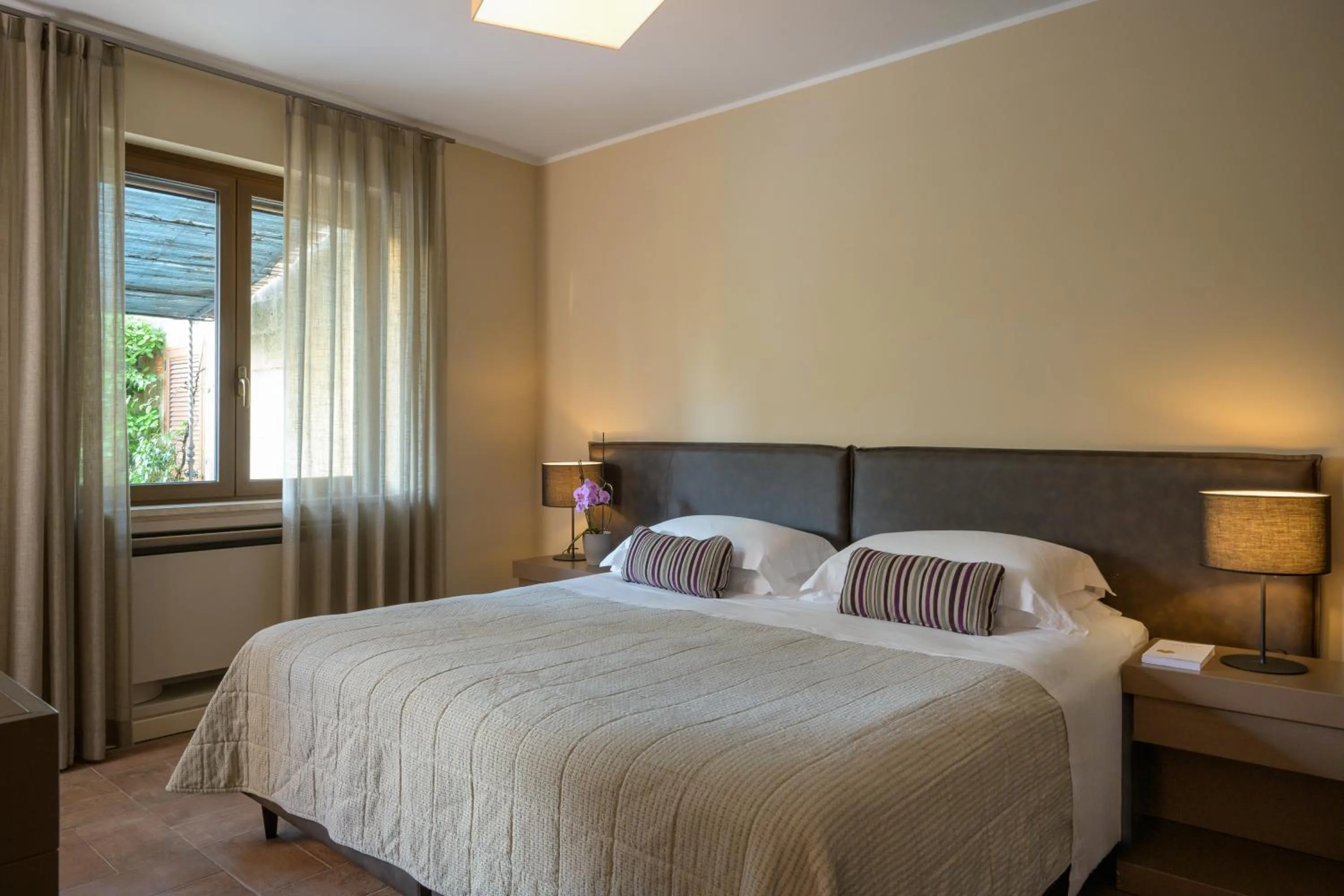 Photo of the whole room, Bed in Altarocca Wine Resort Adults Only