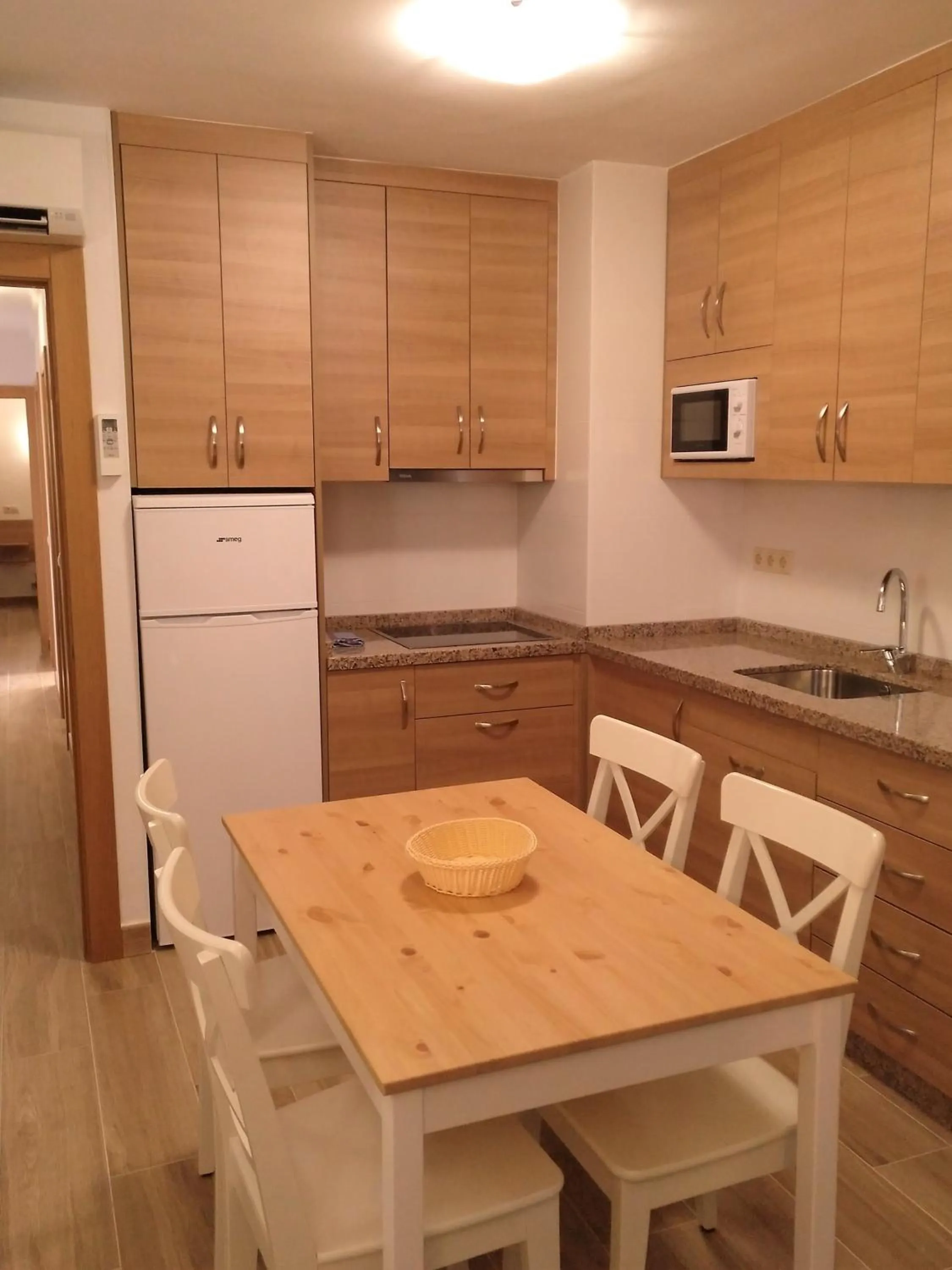 Kitchen or kitchenette in Apartamentos Stella Maris - Marcari SL