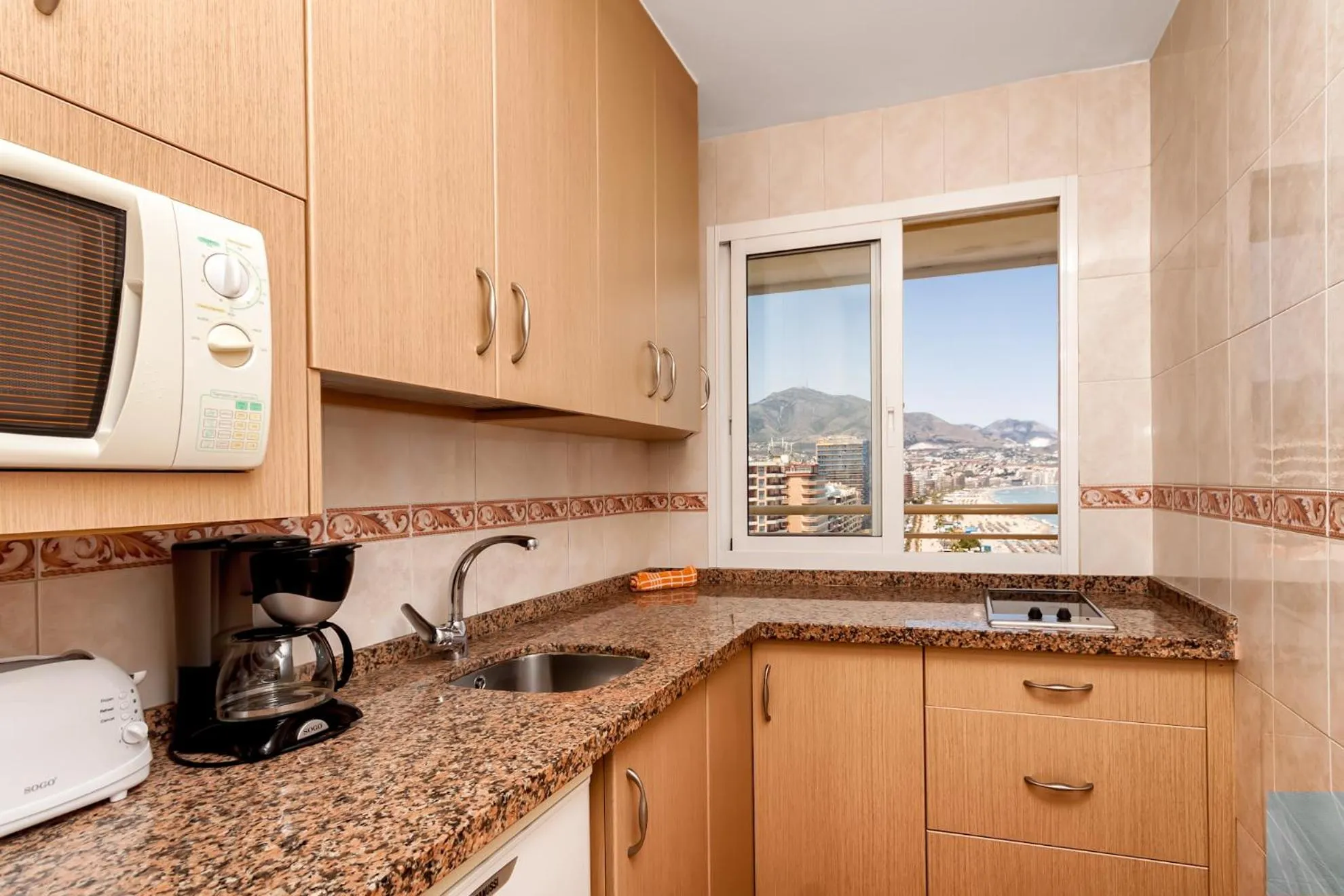 Kitchen or kitchenette in Apartamentos Stella Maris - Marcari SL