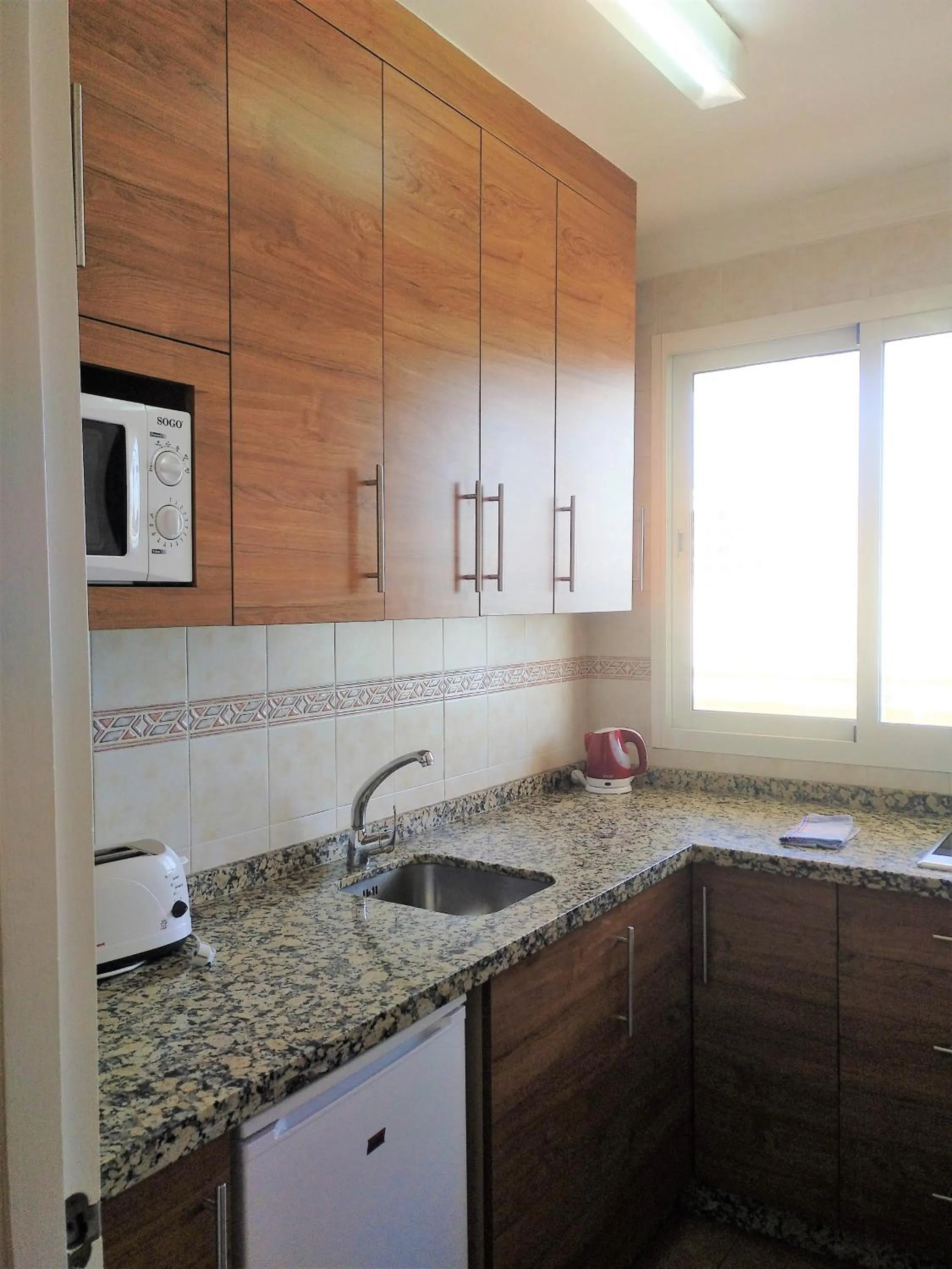 Kitchen or kitchenette in Apartamentos Stella Maris - Marcari SL