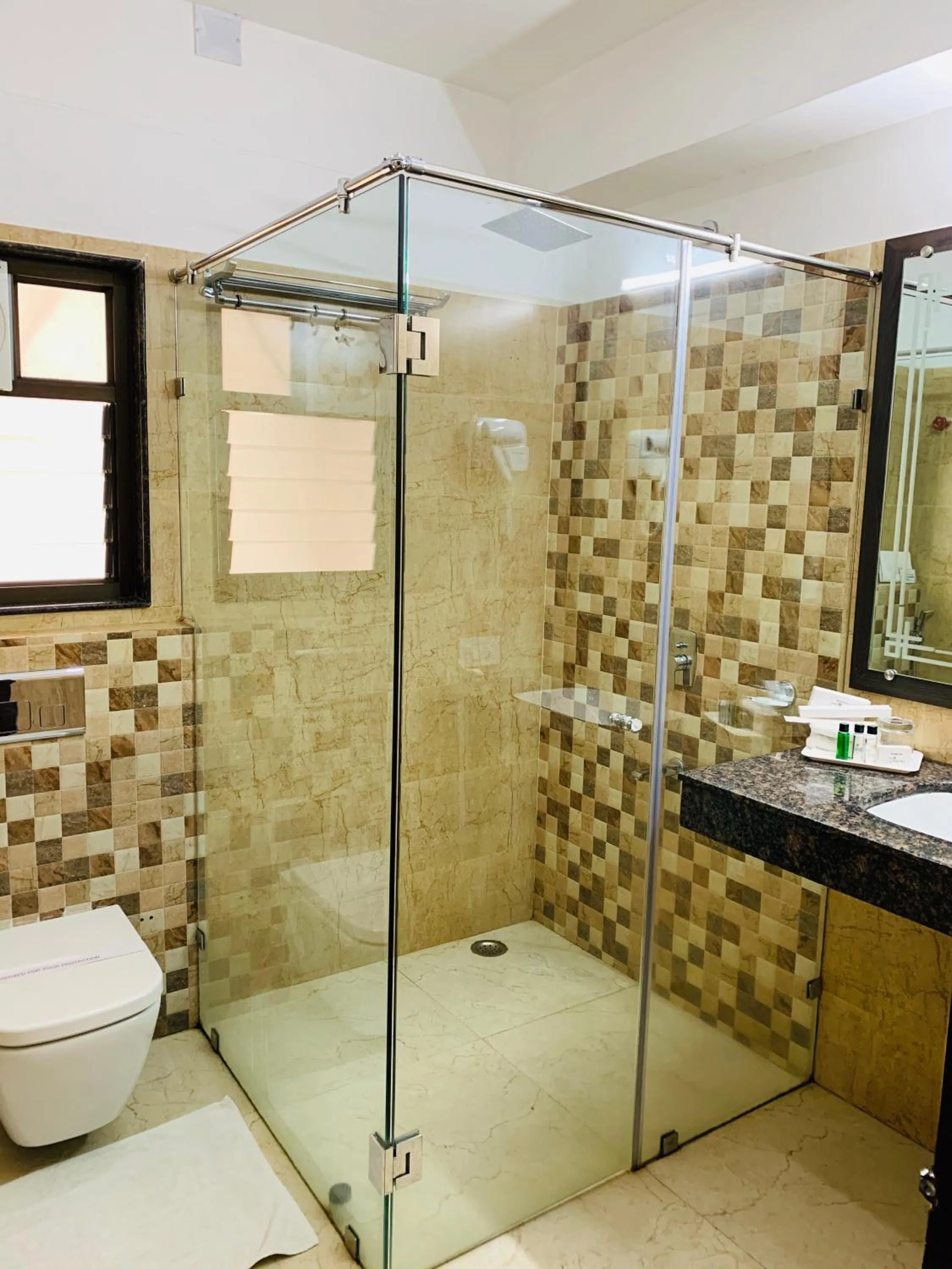 Shower in The Loft Hotel, Siliguri