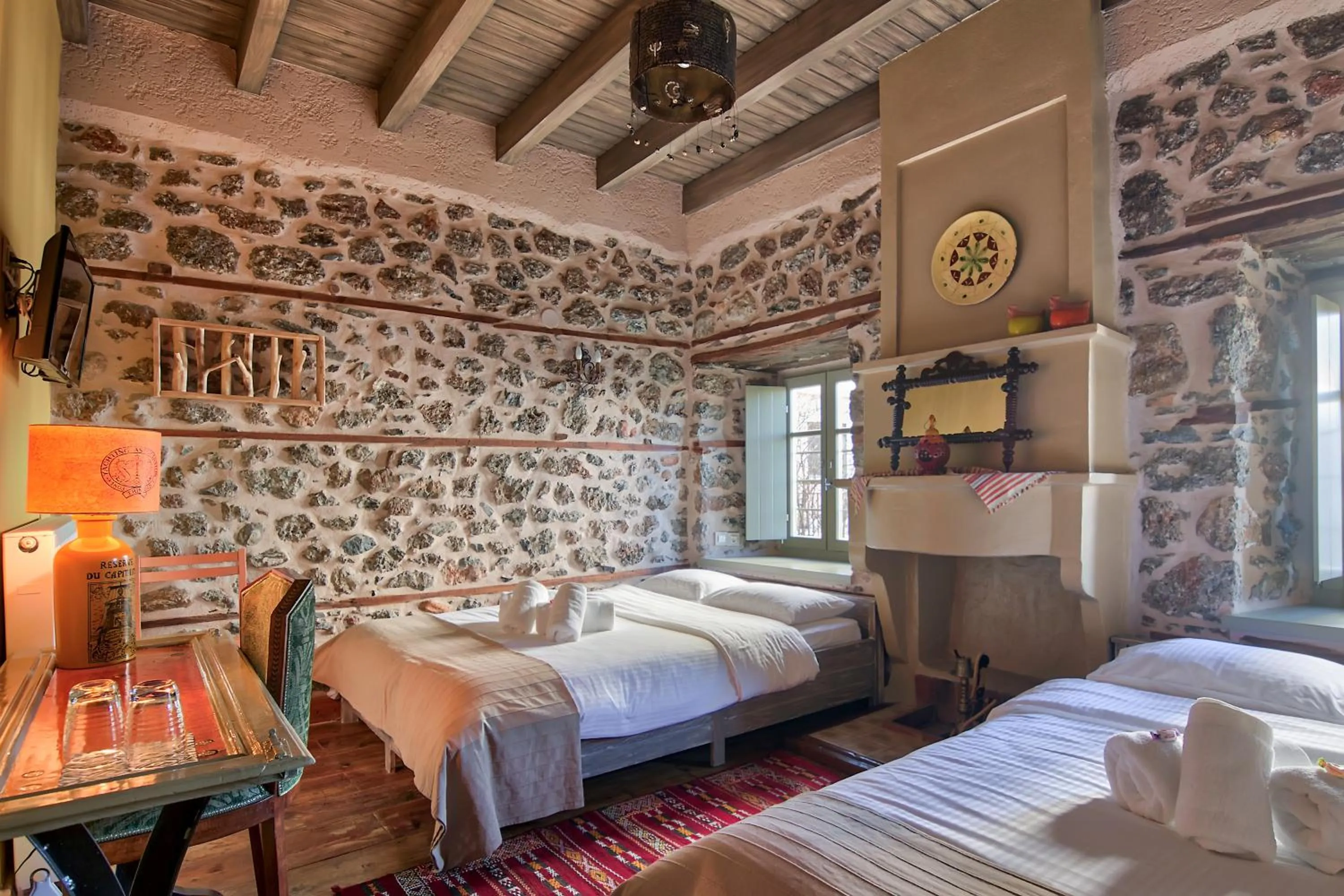 Bed in Bayiri Petit Pension