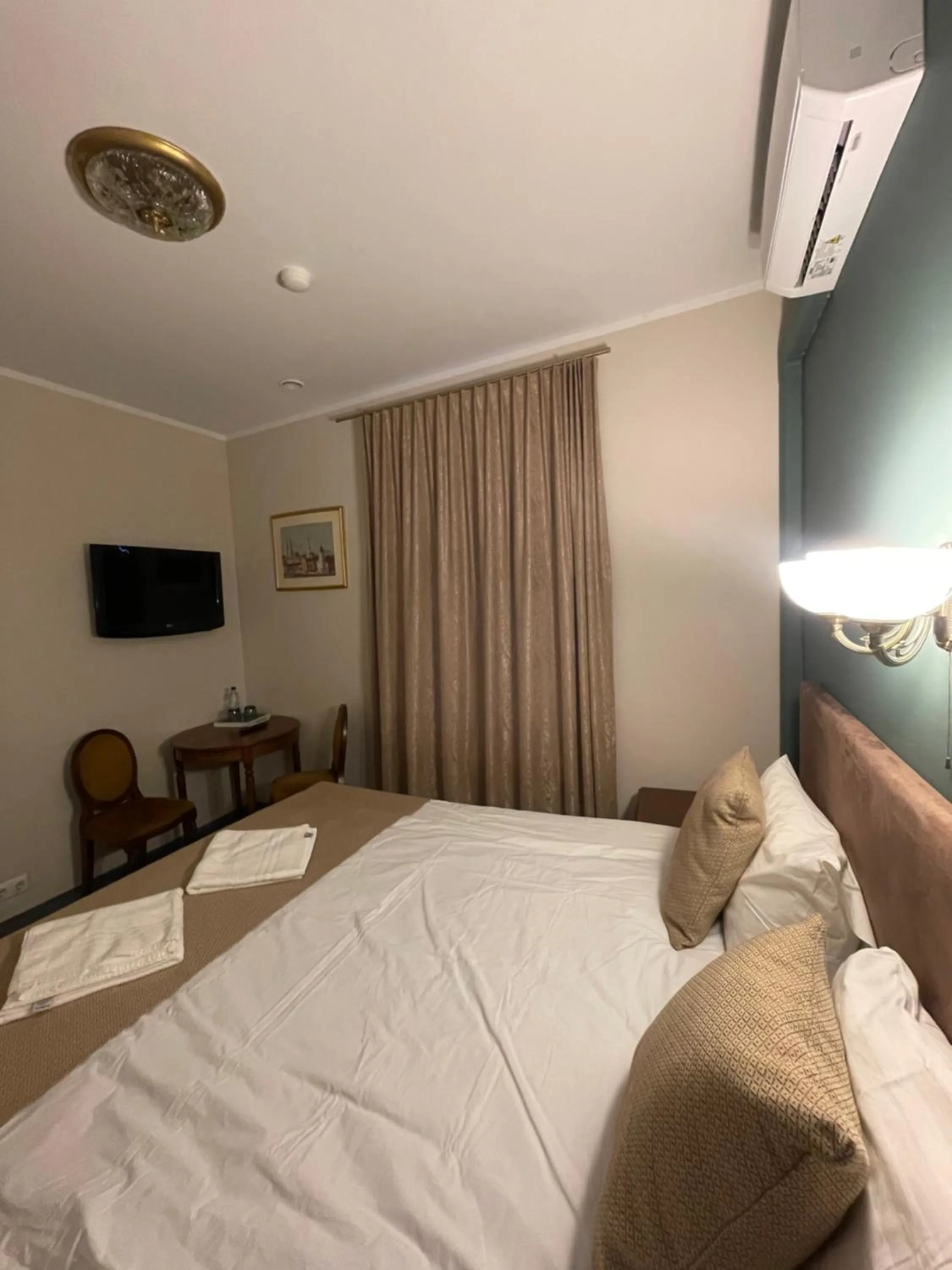 Bed in Apple Economy Hotel