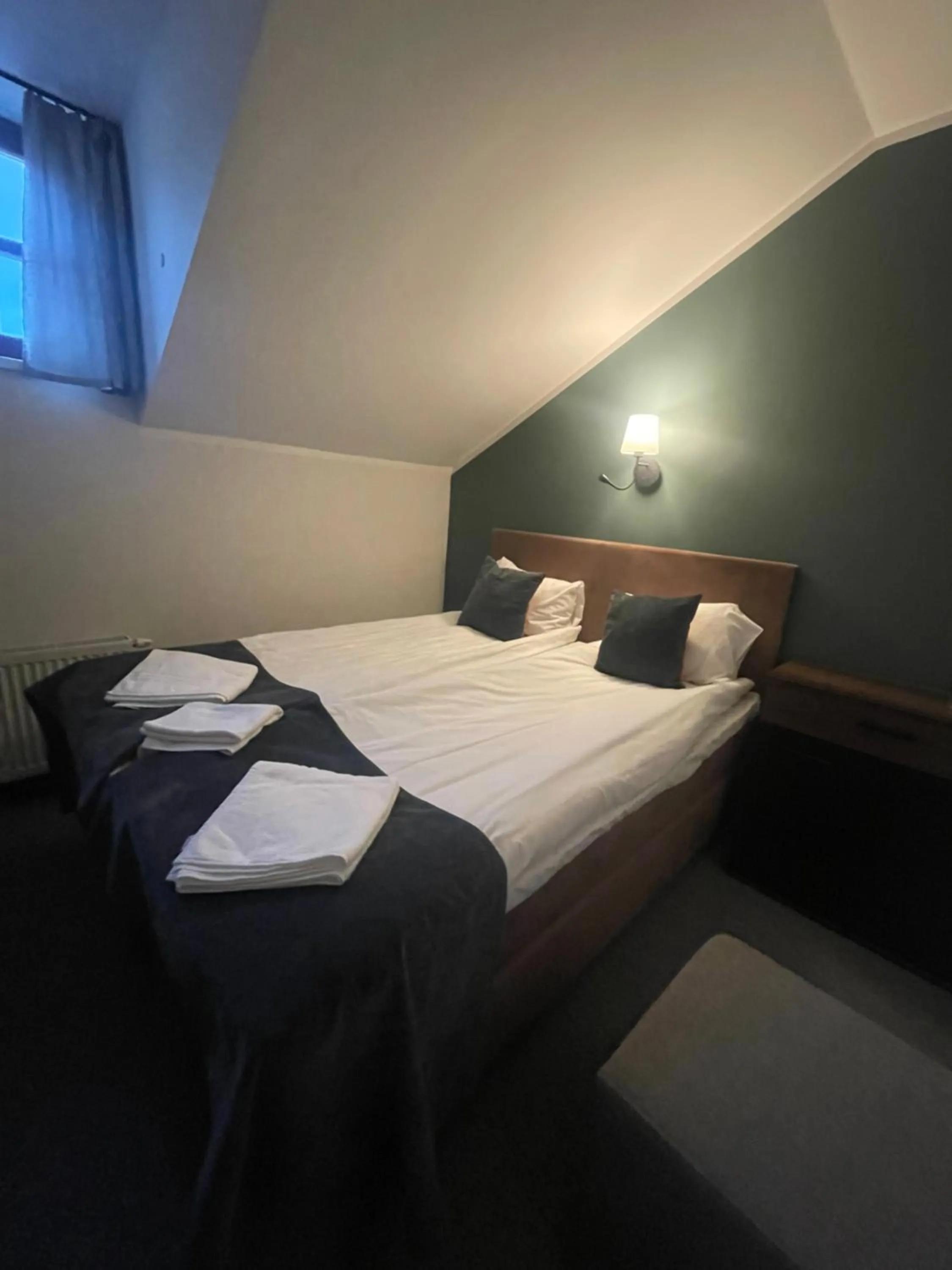 Bed in Apple Economy Hotel