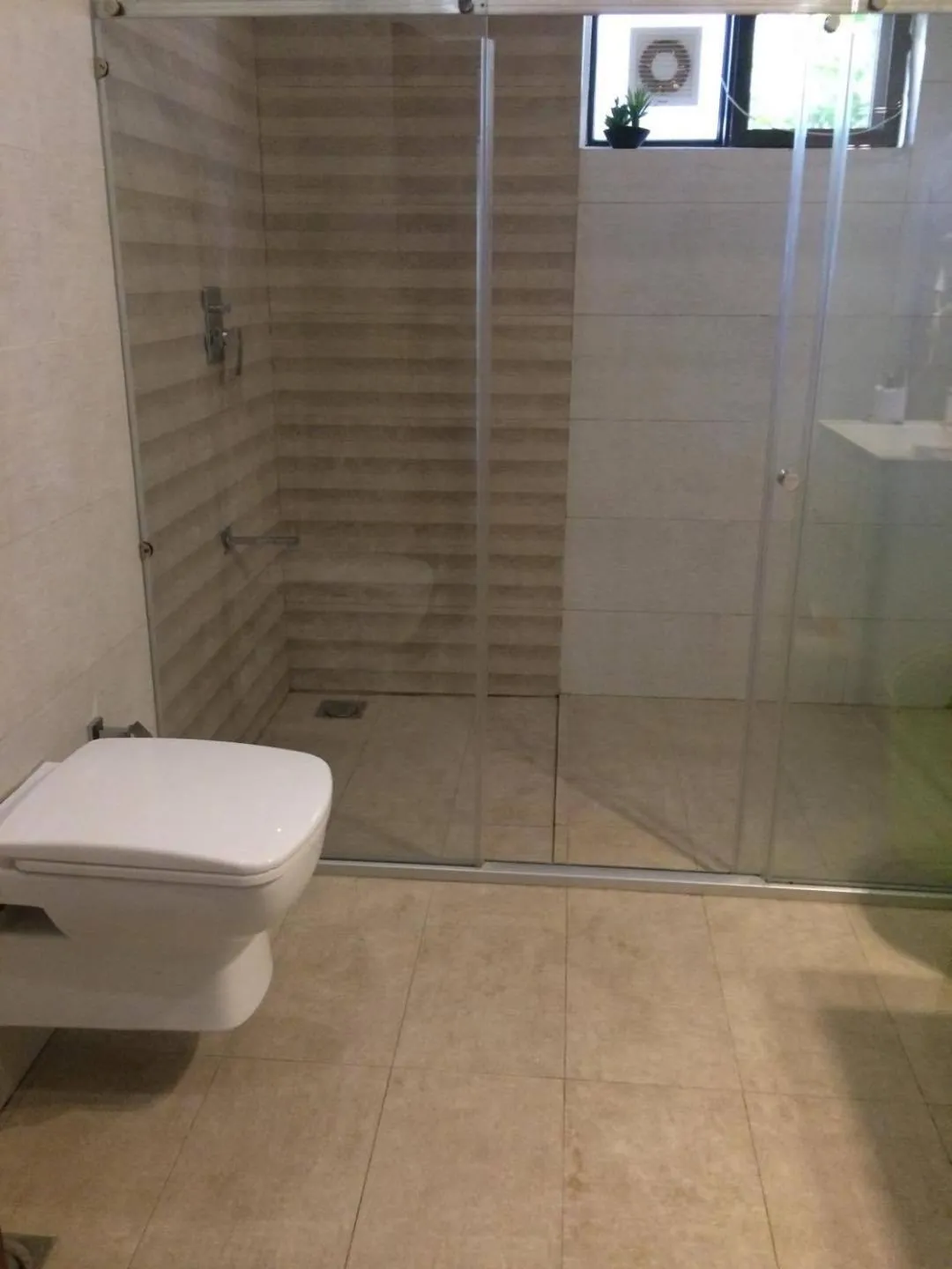 Toilet in Orchards Cottage Hotel