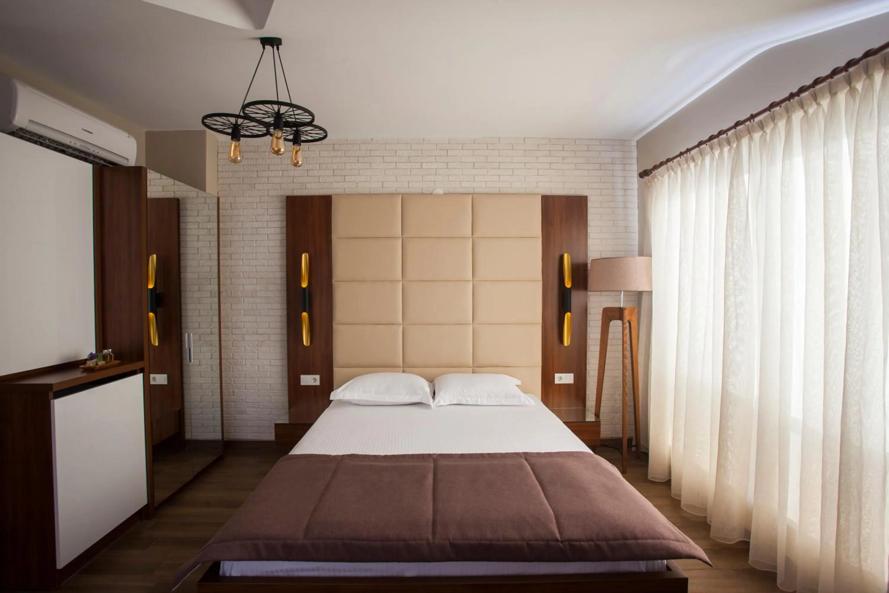 Bed in Maxuite Hotel in Home