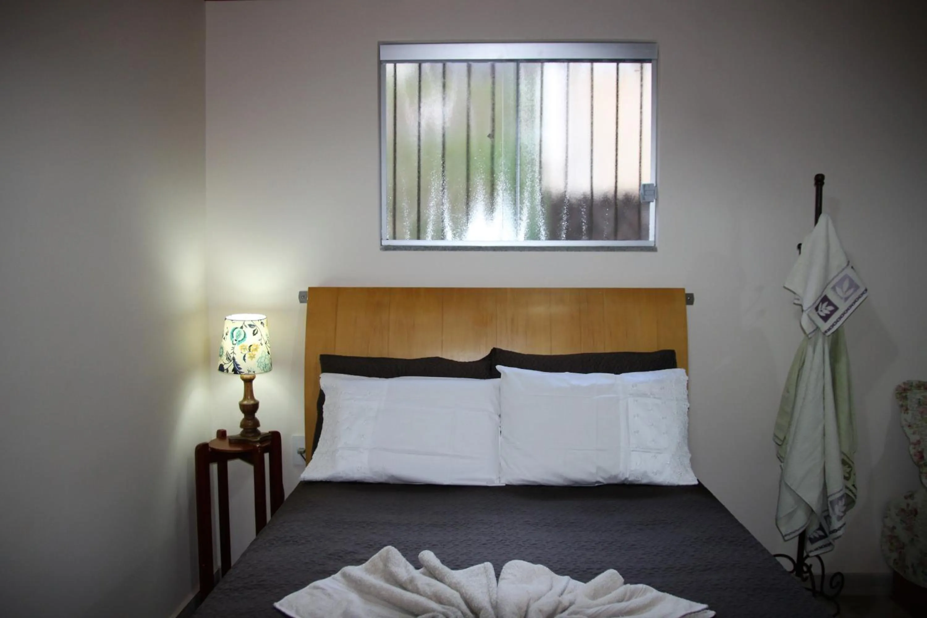 Bed in Chalé do Lago