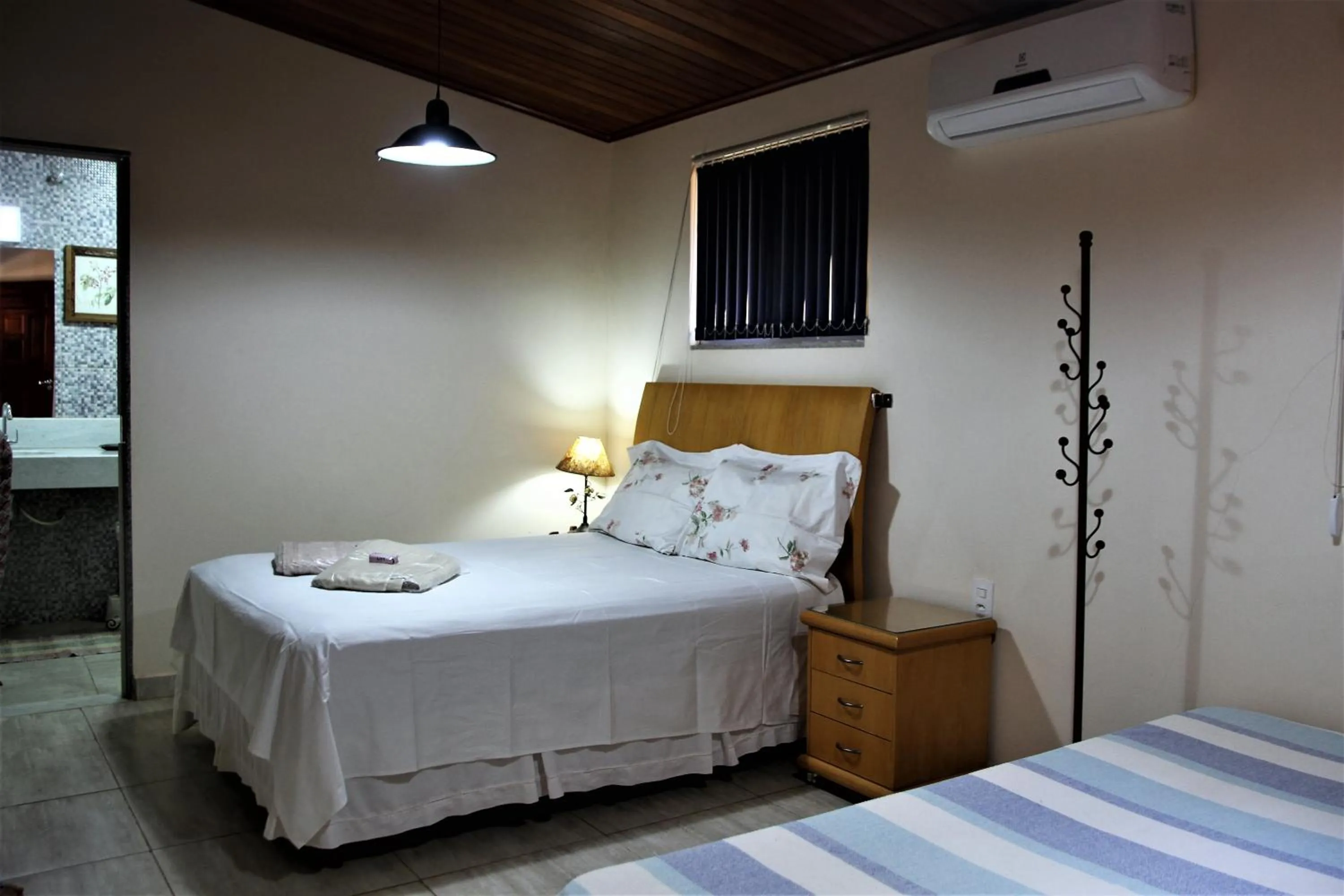 View (from property/room), Bed in Chalé do Lago