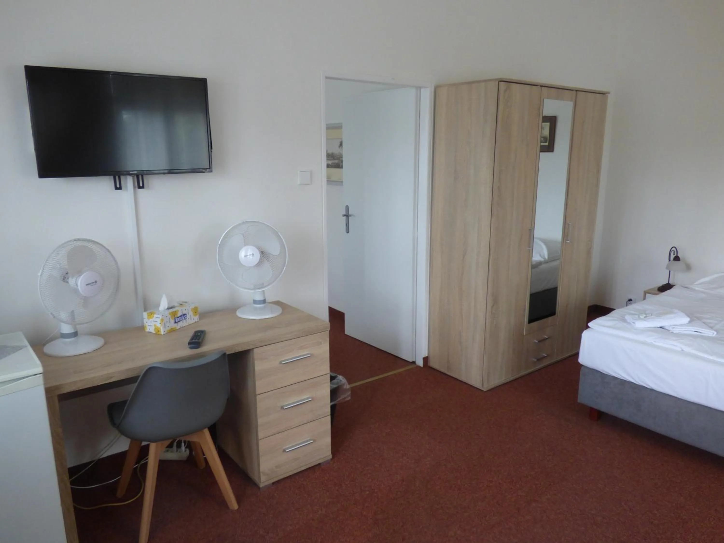 Seating area, Bed in Hotel Svornost