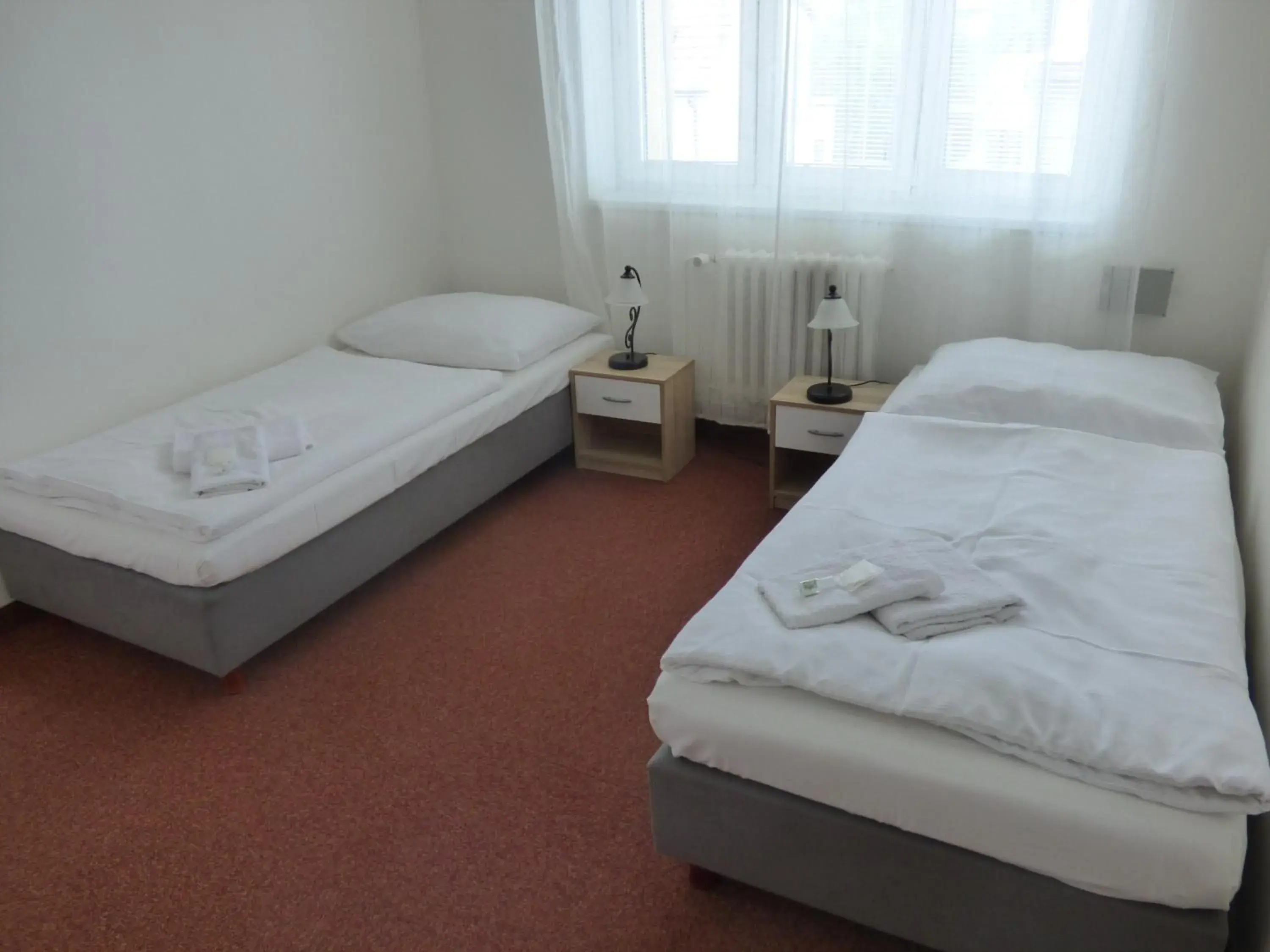 Economy Quadruple Room in Hotel Svornost Economy Quadruple Room in Hotel Svornost