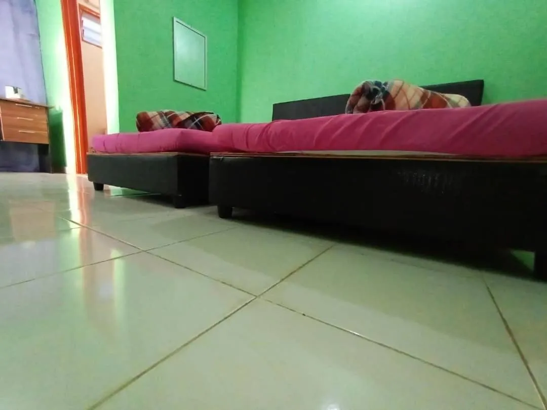 Bed in DAOH'S Rooms & Scooters