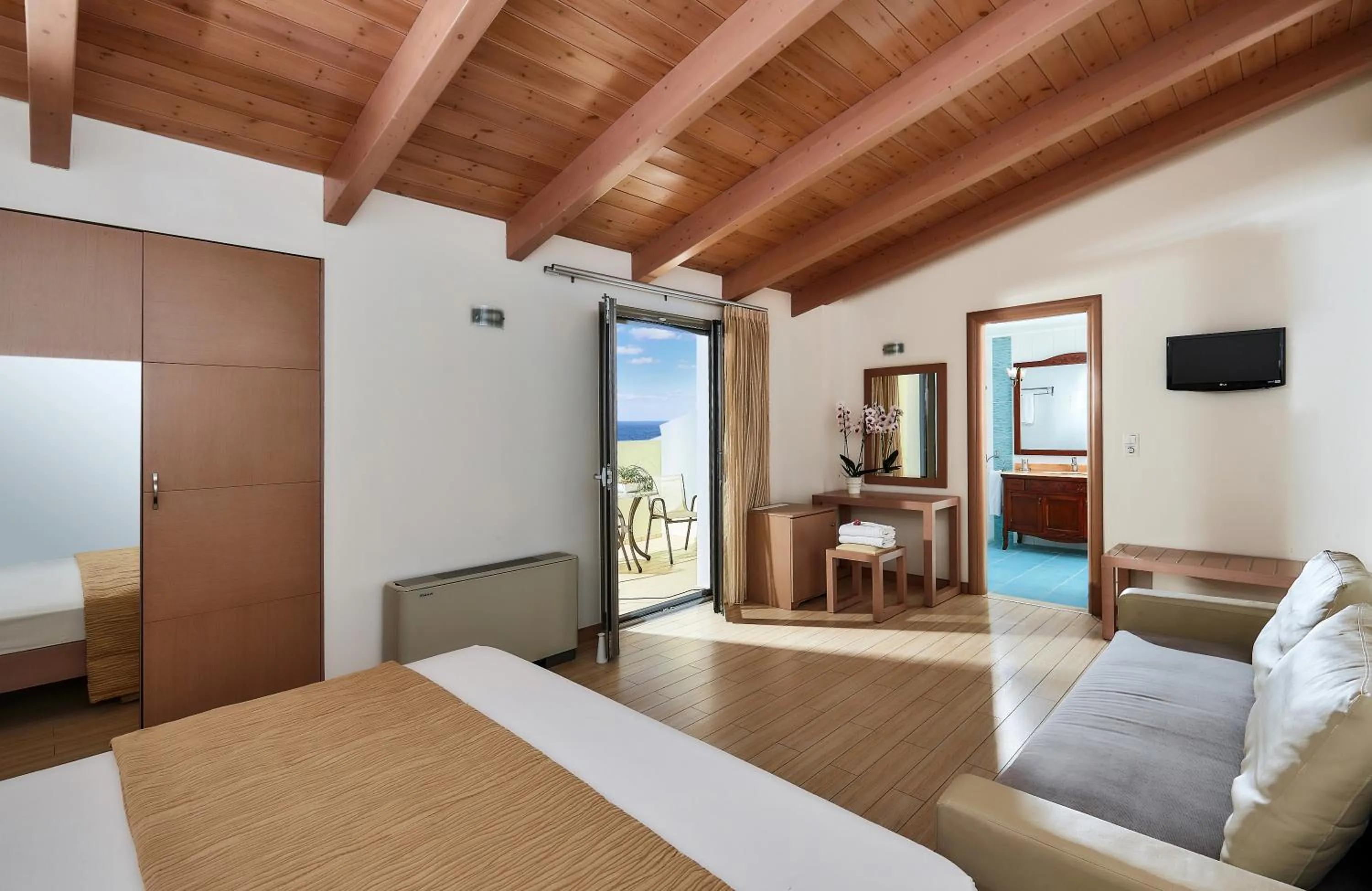 Bed in Panormo Beach Hotel