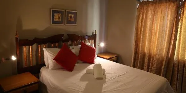 Bed in Klein Windhoek Guesthouse