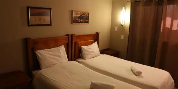 Bed in Klein Windhoek Guesthouse