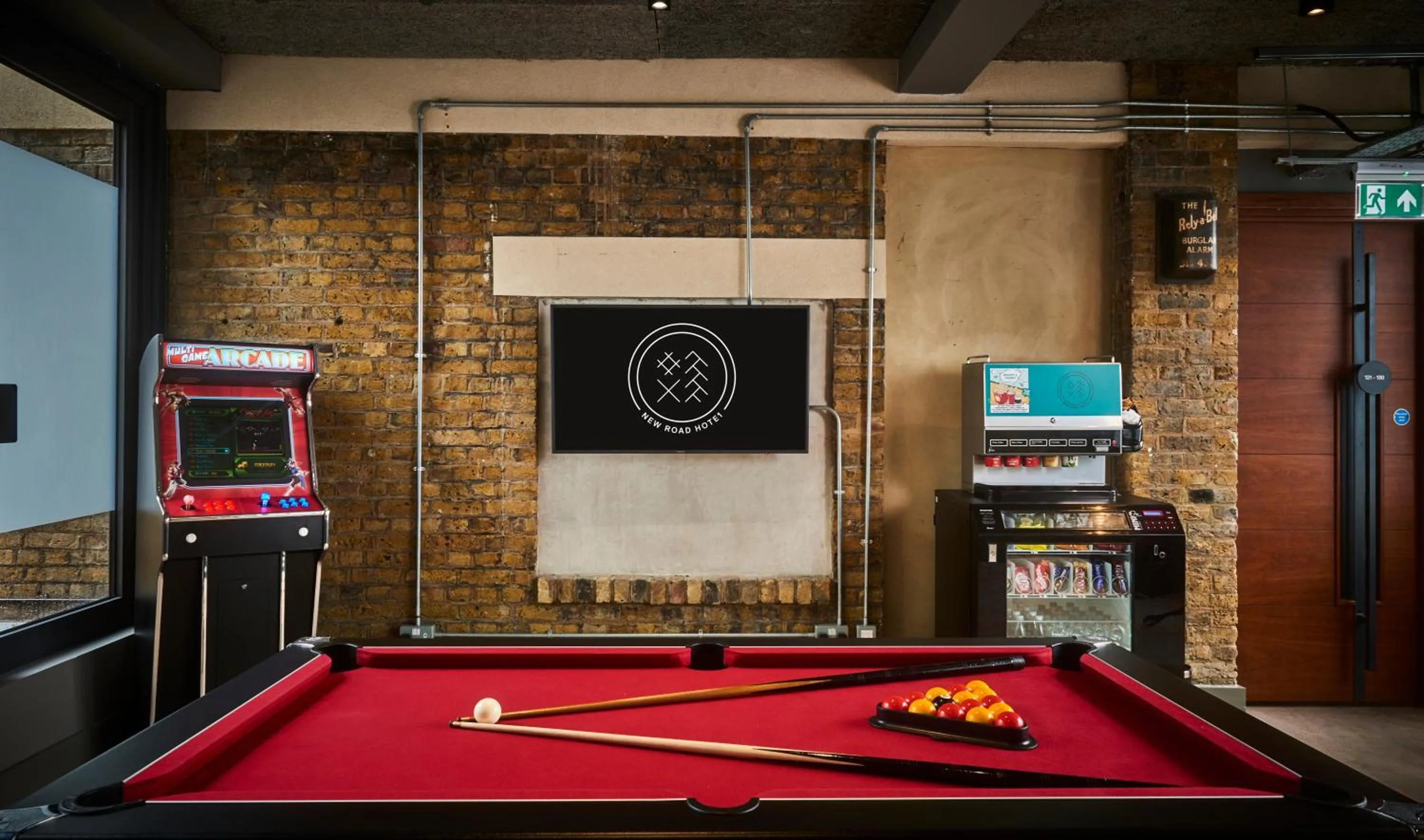 Communal lounge/ TV room in New Road Hotel