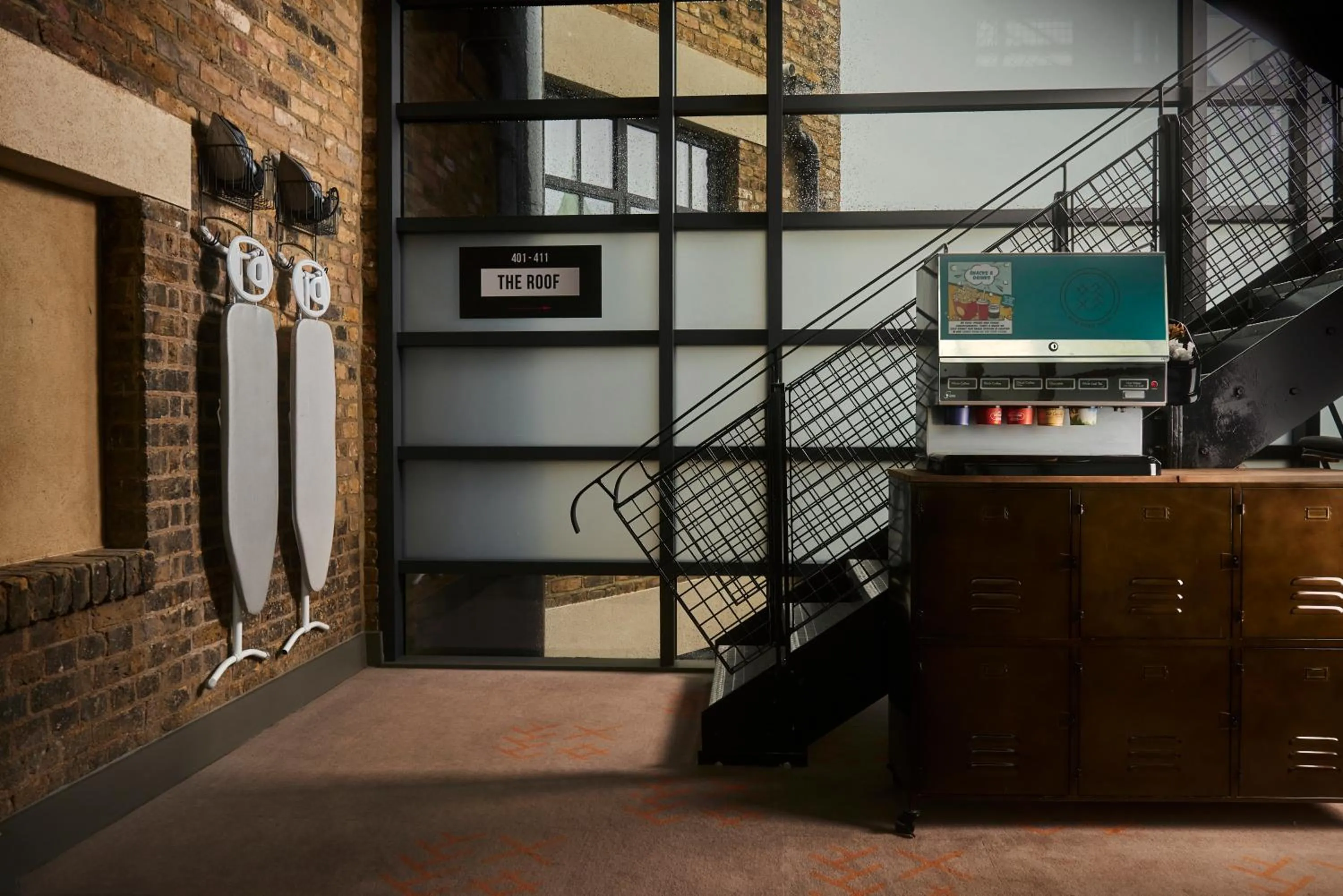 Communal lounge/ TV room in New Road Hotel