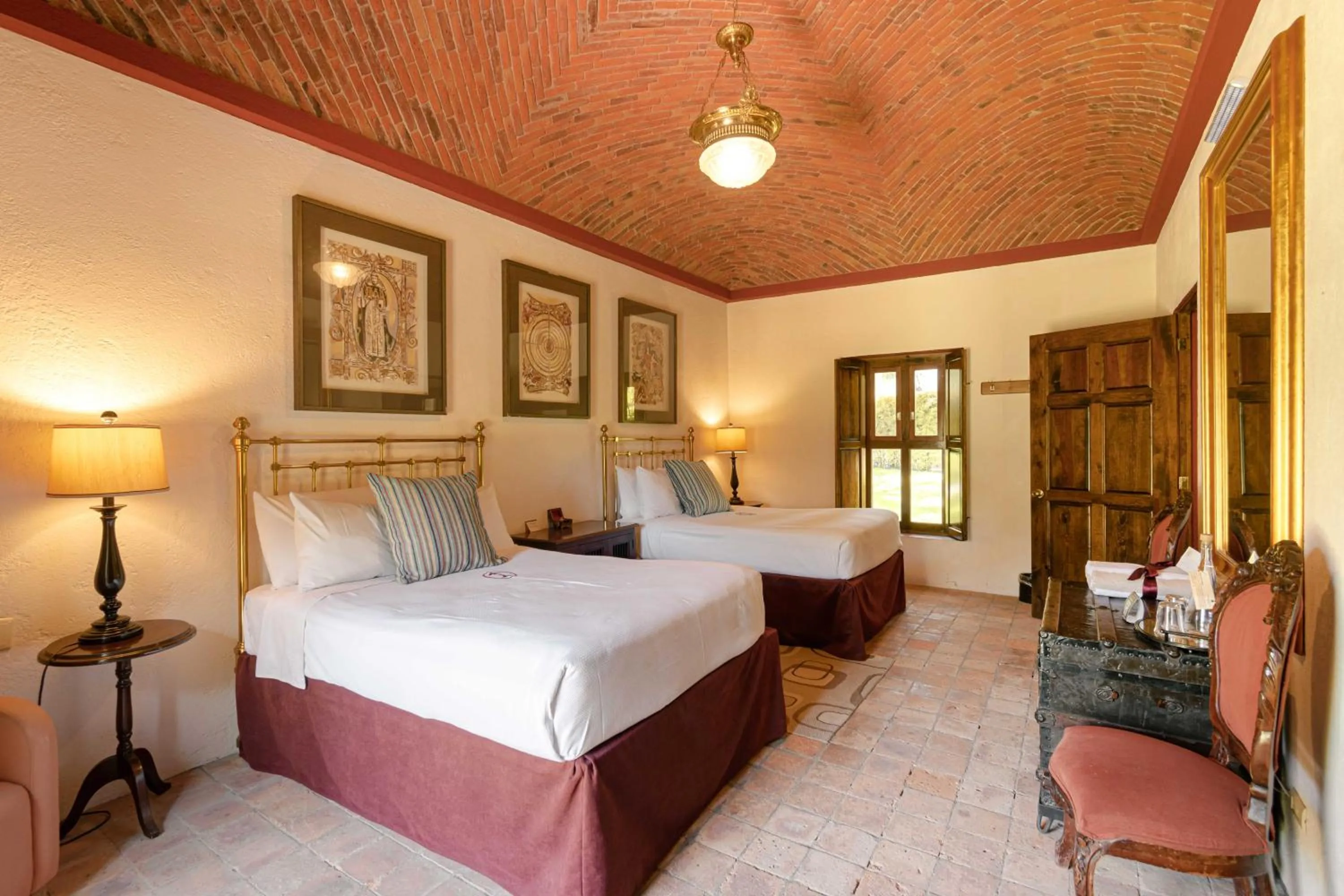 Bed in Hacienda Sepulveda Hotel & Spa