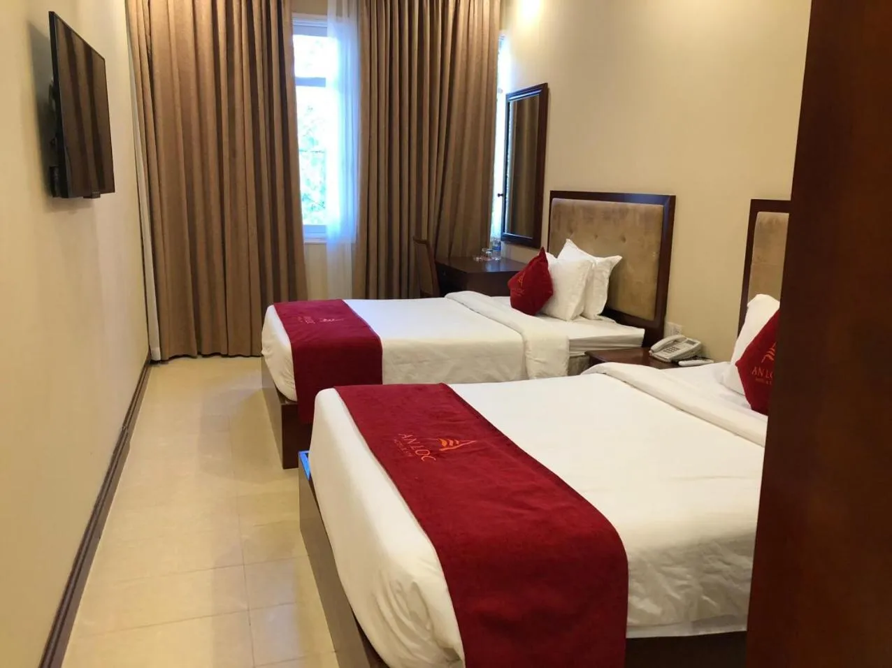 Bed in An Loc Hotel & Spa
