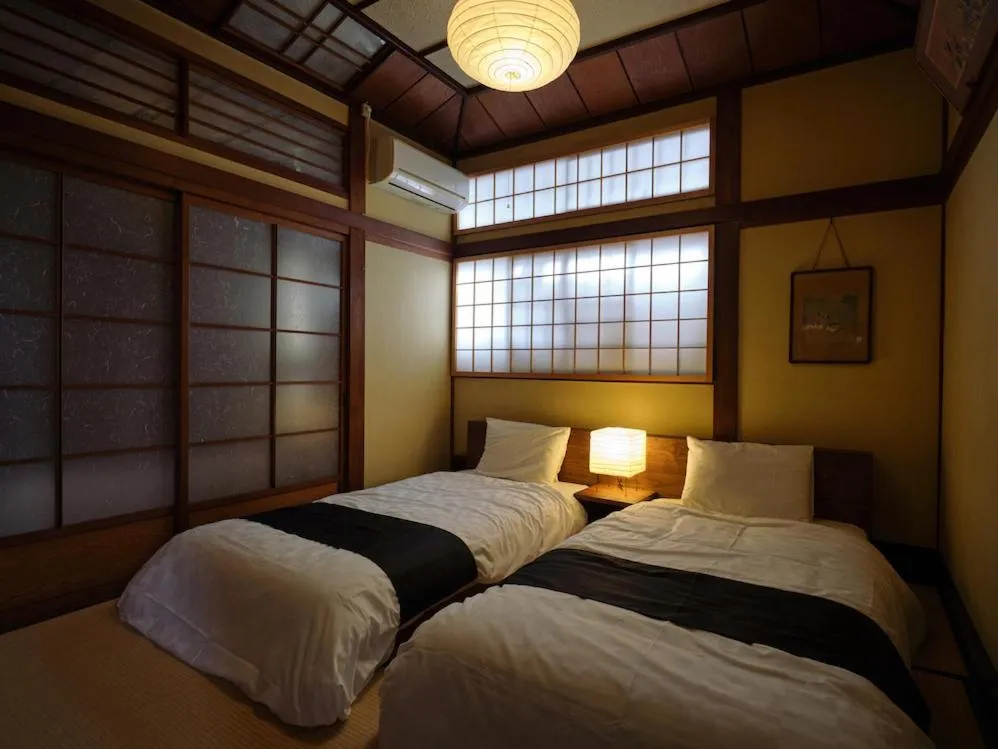 Photo of the whole room, Bed in Obama Machiya Stay