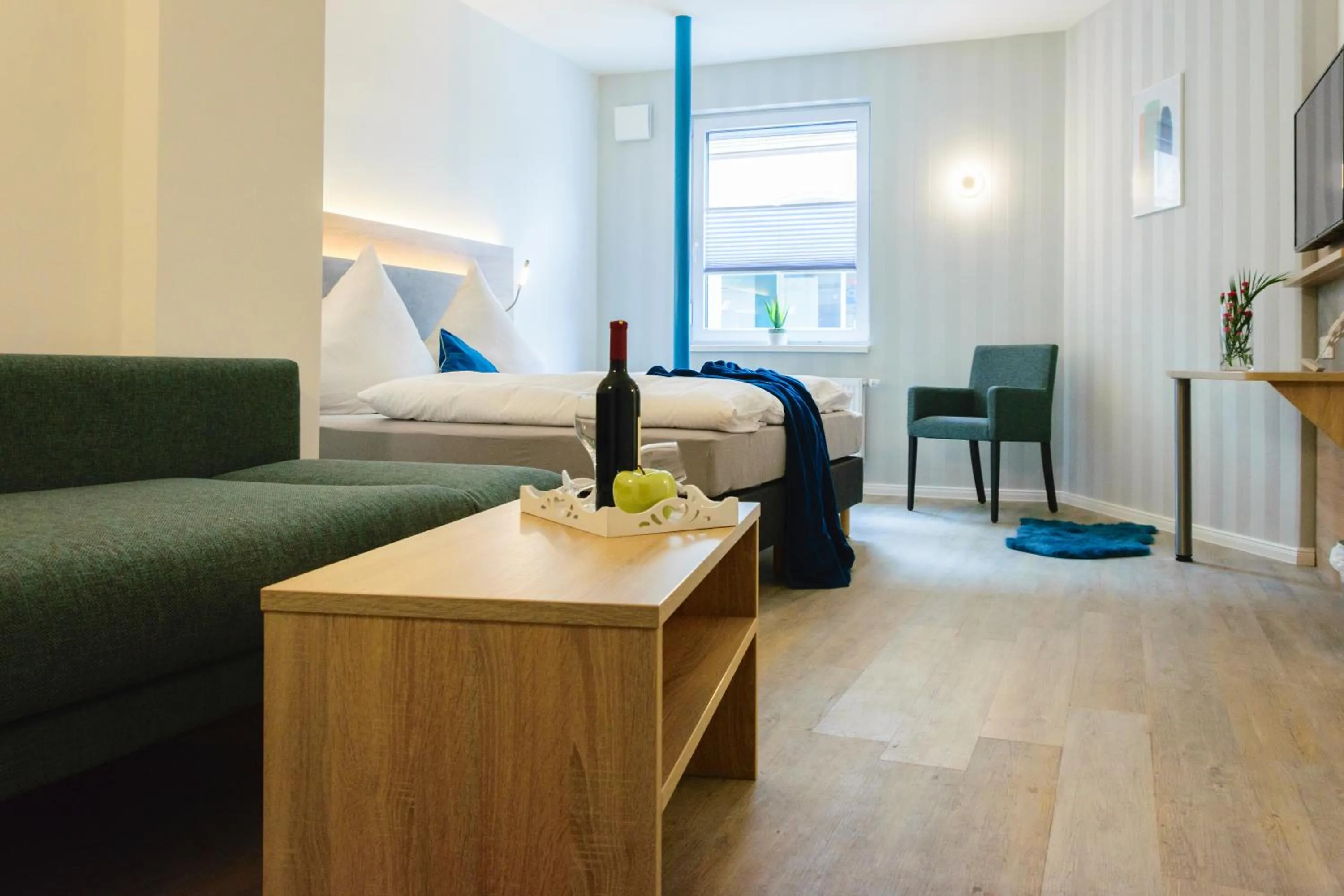 Living room, Bed in Hotel Zur Alten Börse