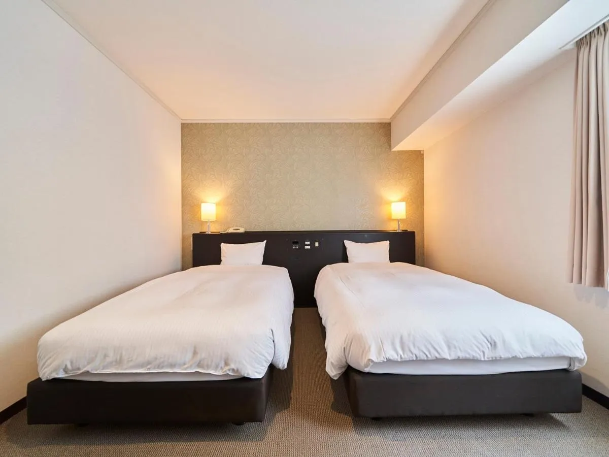 Bed in Hotel Global View Sapporo Old Hotel Royal Stay Sapporo