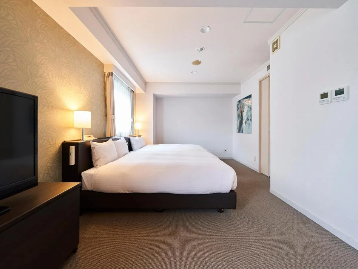 Bed in Hotel Global View Sapporo Old Hotel Royal Stay Sapporo