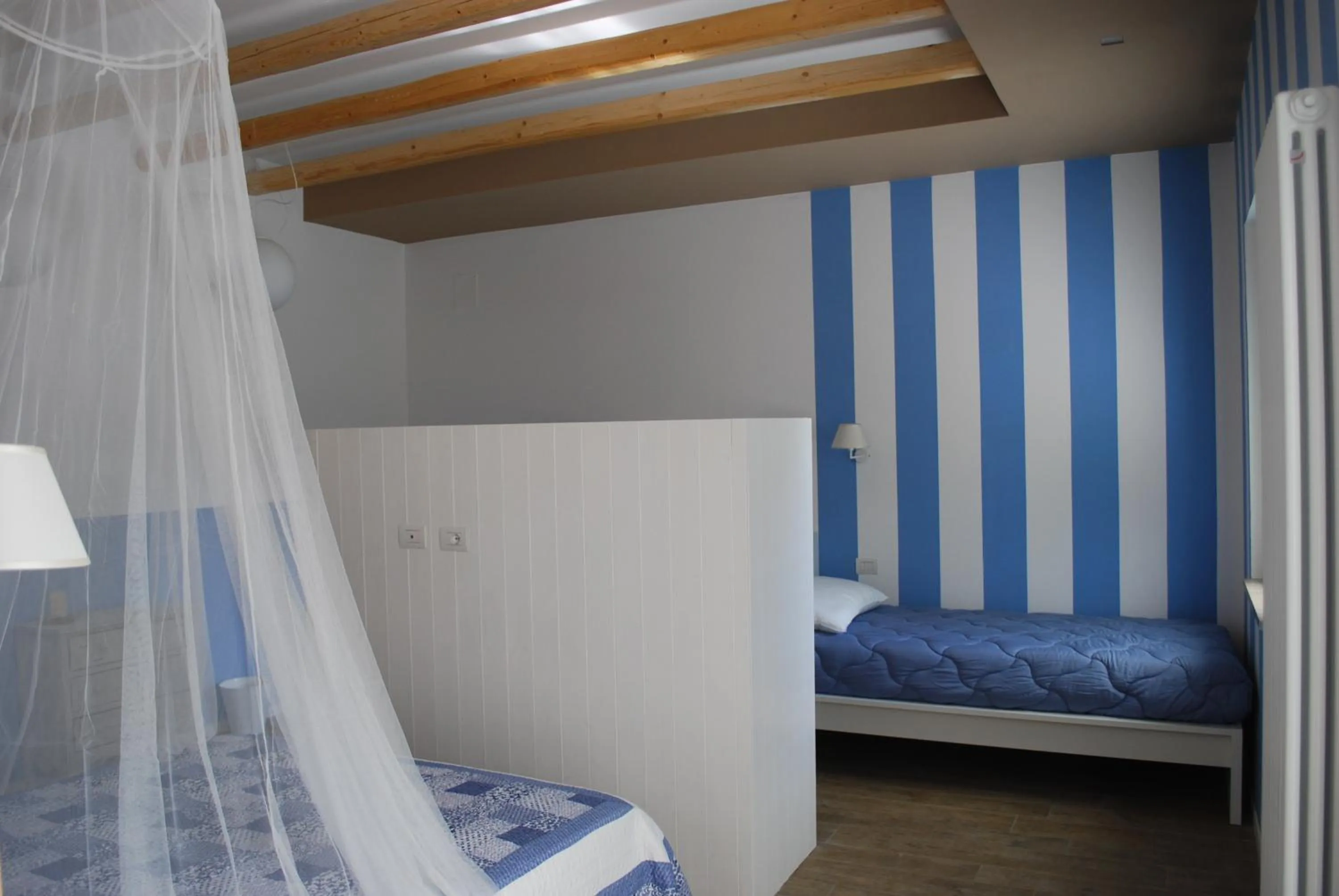 Bed in Casa Polly B&B